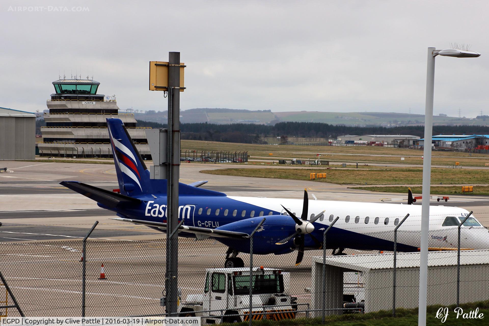 Aberdeen Airport, Aberdeen, Scotland United Kingdom (EGPD) - View across the Eastern Airways apron toward the control tower at Aberdeen EGPD