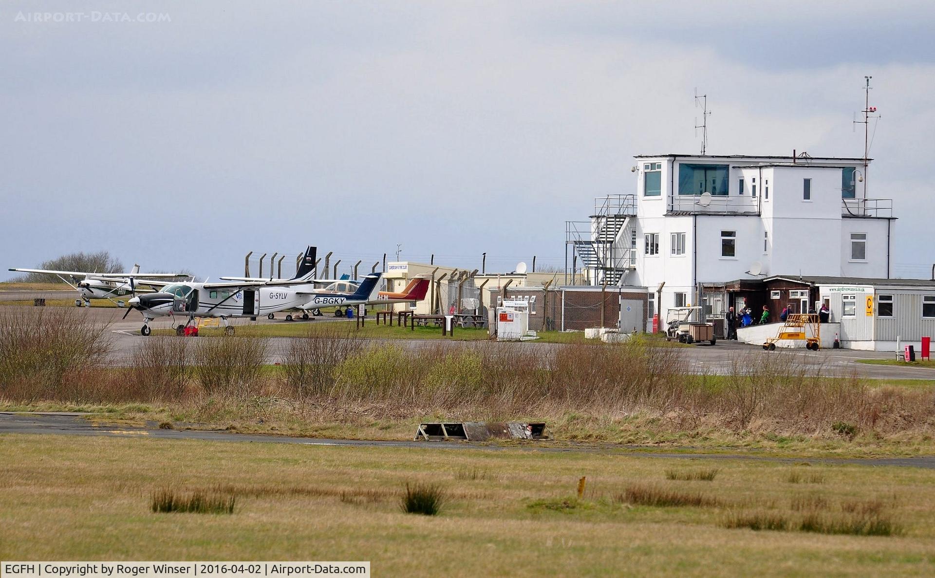 Swansea Airport, Swansea, Wales United Kingdom (EGFH) - Apron and main terminal building/control tower.