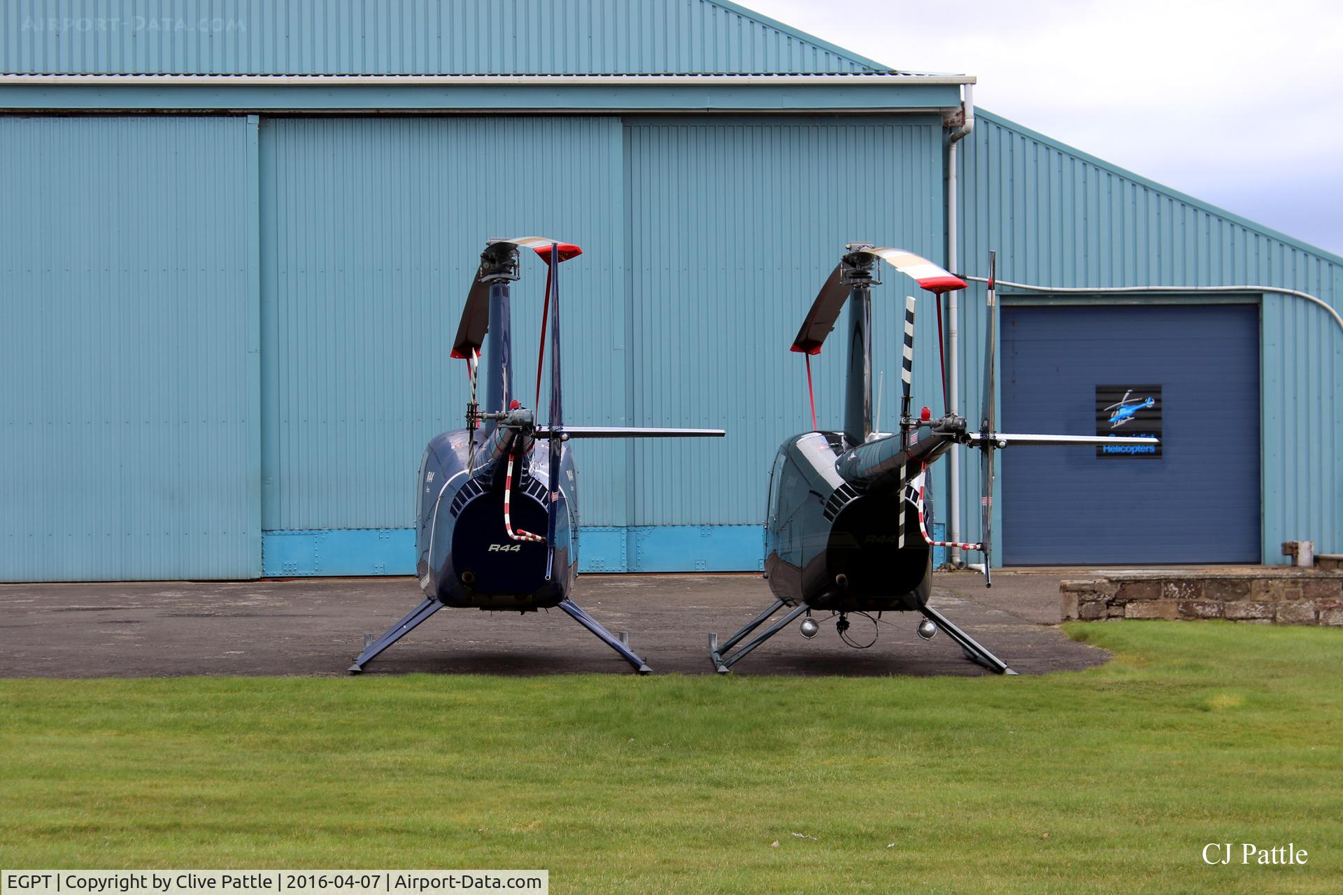 Perth Airport (Scotland), Perth, Scotland United Kingdom (EGPT) - Specialist Helicopters Ltd R44's parked outside their hangar at Perth EGPT