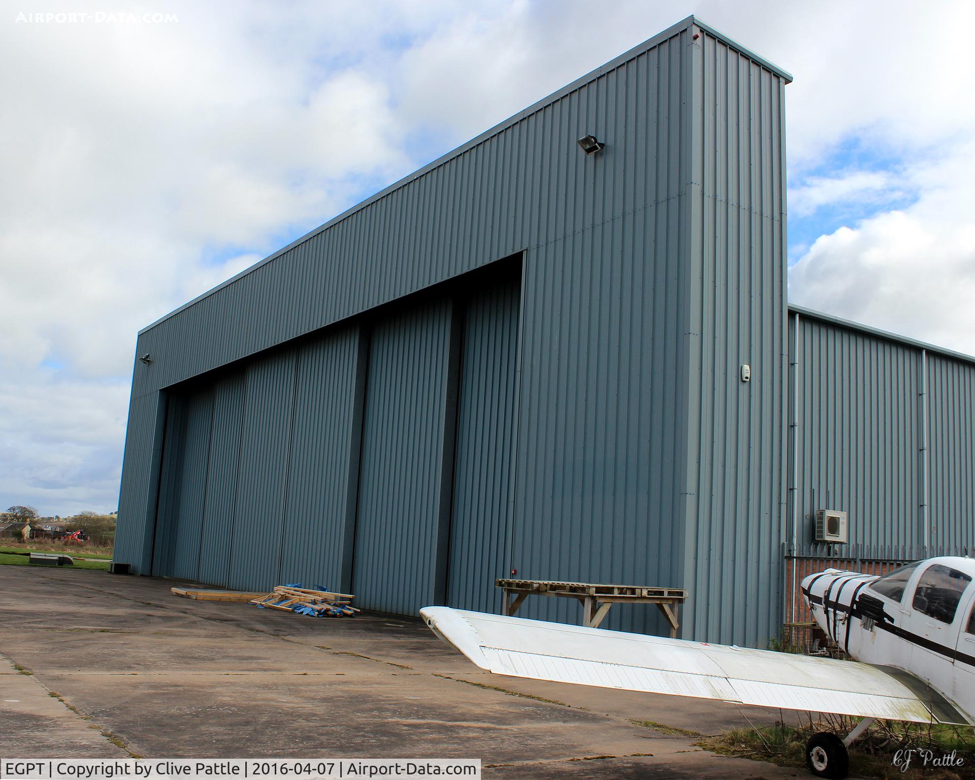 Perth Airport (Scotland), Perth, Scotland United Kingdom (EGPT) - The easternmost hangar at Perth EGPT is occupied by Airwork Service Training (AST). This building houses classrooms and engine and airframe instructional items for the benefit of their multi-national students.