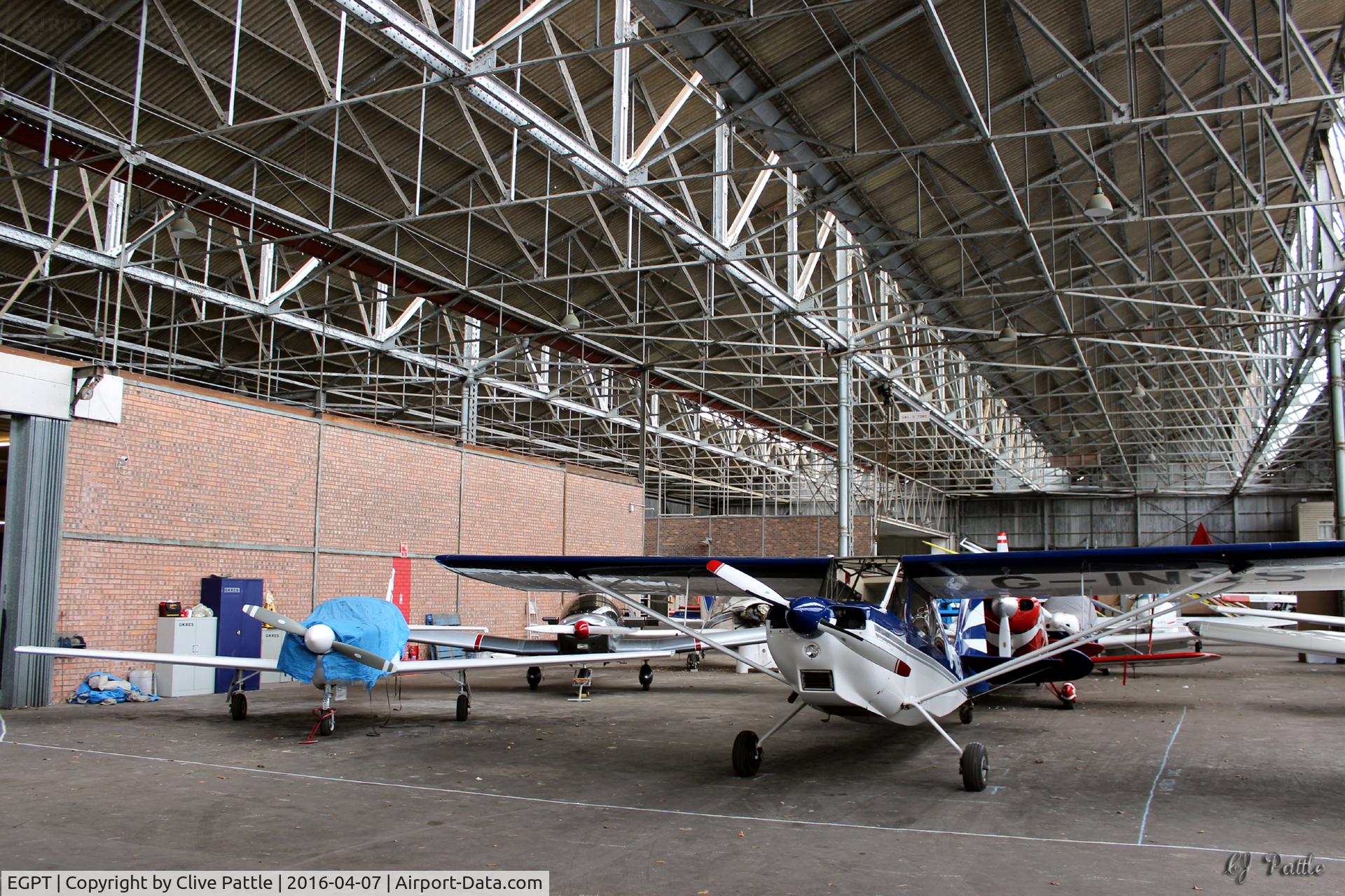 Perth Airport (Scotland), Perth, Scotland United Kingdom (EGPT) - General internal hangar view at Perth EGPT, highlighting the 1938 WWII roof construction, maximising on light.
