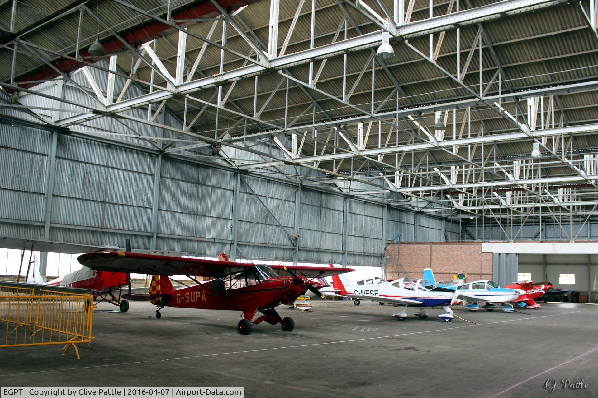 Perth Airport (Scotland), Perth, Scotland United Kingdom (EGPT) - General internal hangar view at Perth EGPT, highlighting the 1938 WWII roof construction, maximising on light.