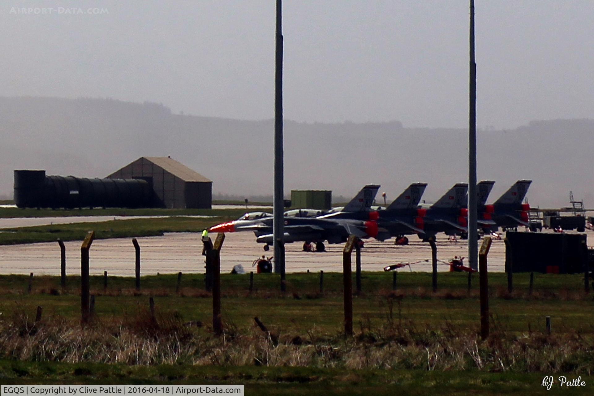 RAF Lossiemouth Airport, Lossiemouth, Scotland United Kingdom (EGQS) - A long heat-haze affected shot of the Turkish F-16 contingent parked on the 15R Sqn ramp at RAF Lossiemouth EGQS during Exercise Joint Warrior 16-1