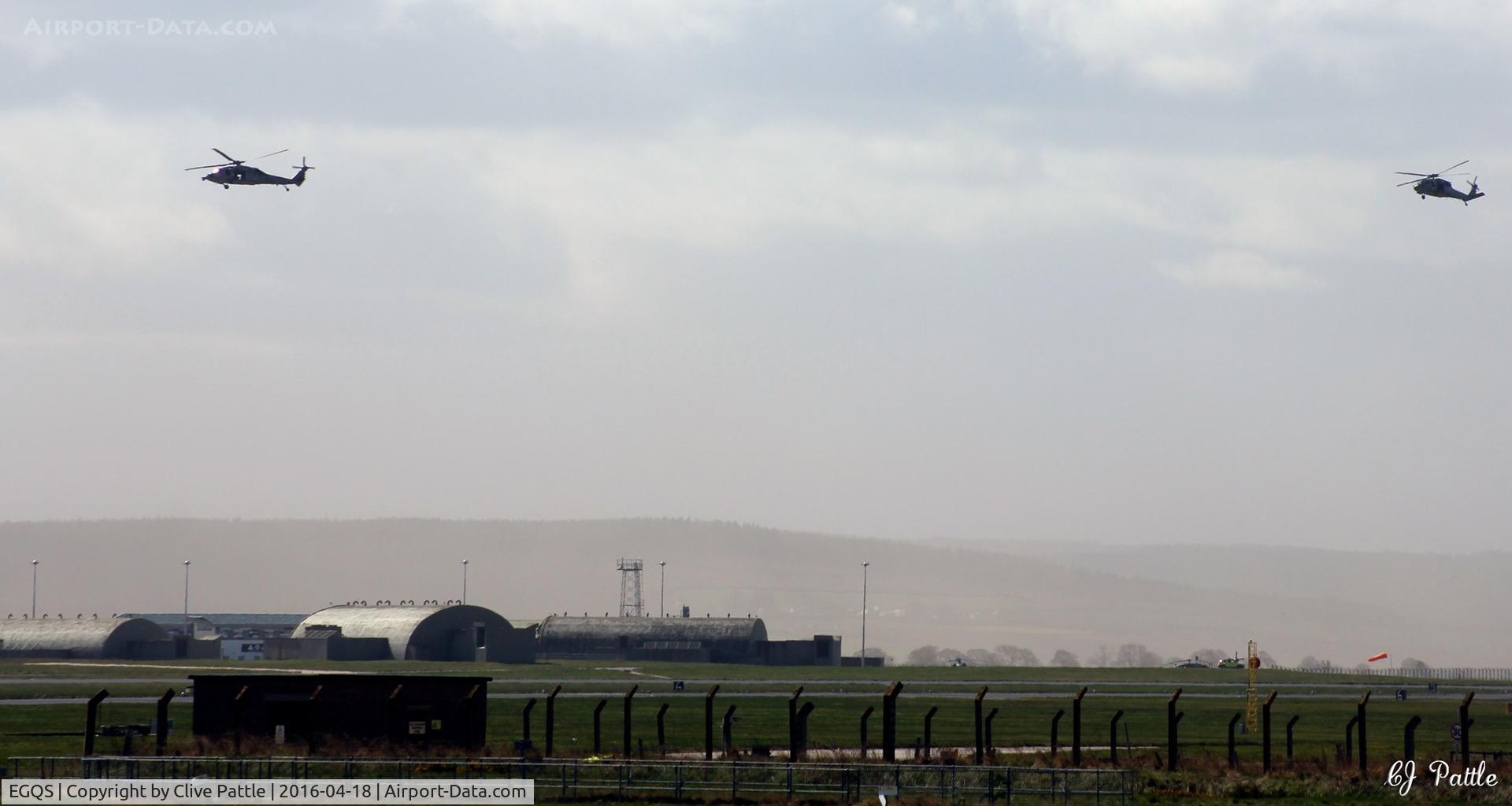RAF Lossiemouth Airport, Lossiemouth, Scotland United Kingdom (EGQS) - A view of the HAS sites on the south side of RAF Lossiemouth EGQS with two visiting USAF SH-60's flying overhead - taken during Exercise Joint Warrior 16-1