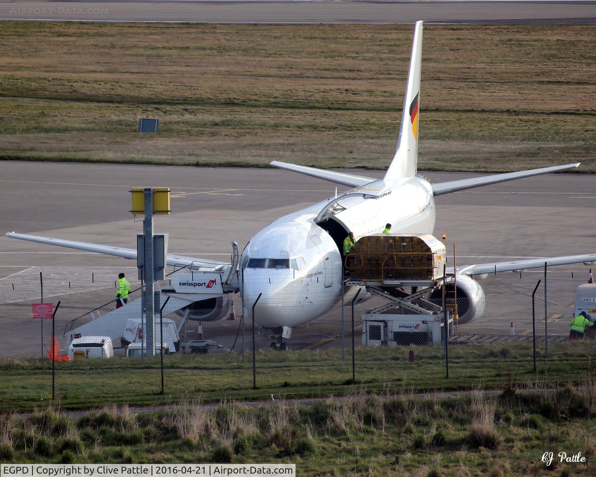 Aberdeen Airport, Aberdeen, Scotland United Kingdom (EGPD) - Cargo unloading at Aberdeen EGPD from Atlantic Airlines B737 G-JMCR