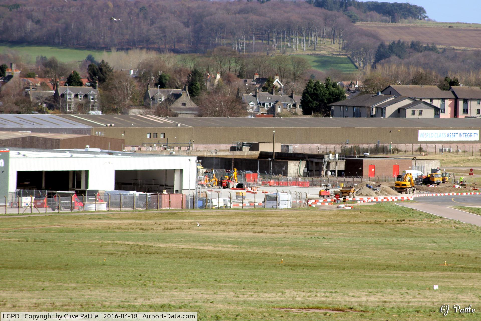 Aberdeen Airport, Aberdeen, Scotland United Kingdom (EGPD) - Aberdeen EGPD east side - new hangar complex for NHV Helicopters - apron being constructed.