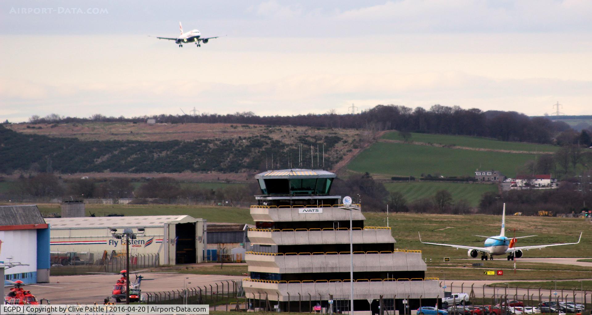 Aberdeen Airport, Aberdeen, Scotland United Kingdom (EGPD) - Lots of activity at Aberdeen EGPD - can you see the line of oil workers boarding their helicopter ?