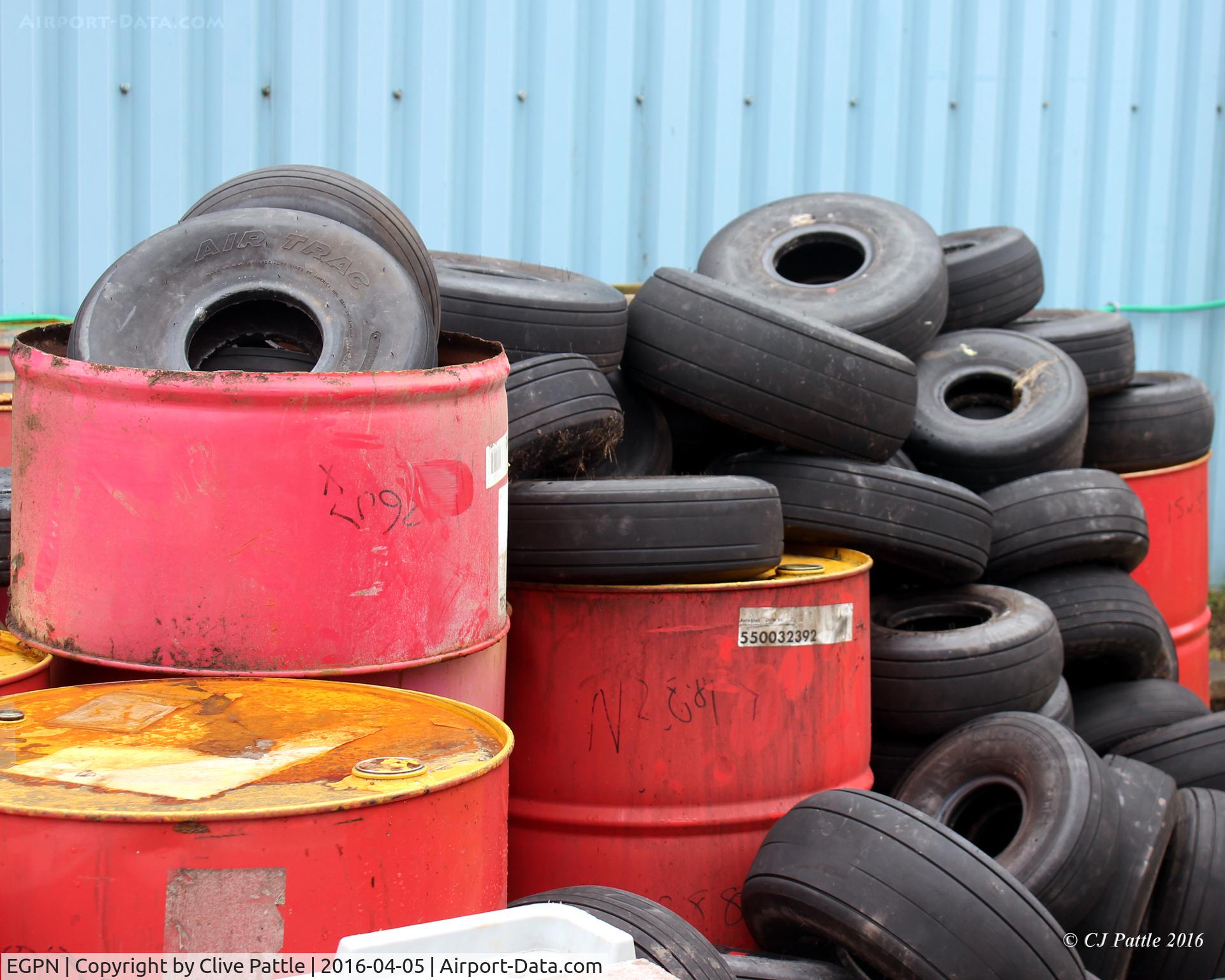 Dundee Airport, Dundee, Scotland United Kingdom (EGPN) - Looking tyred at Dundee Riverside EGPN - used aircraft tyres collection for recycling