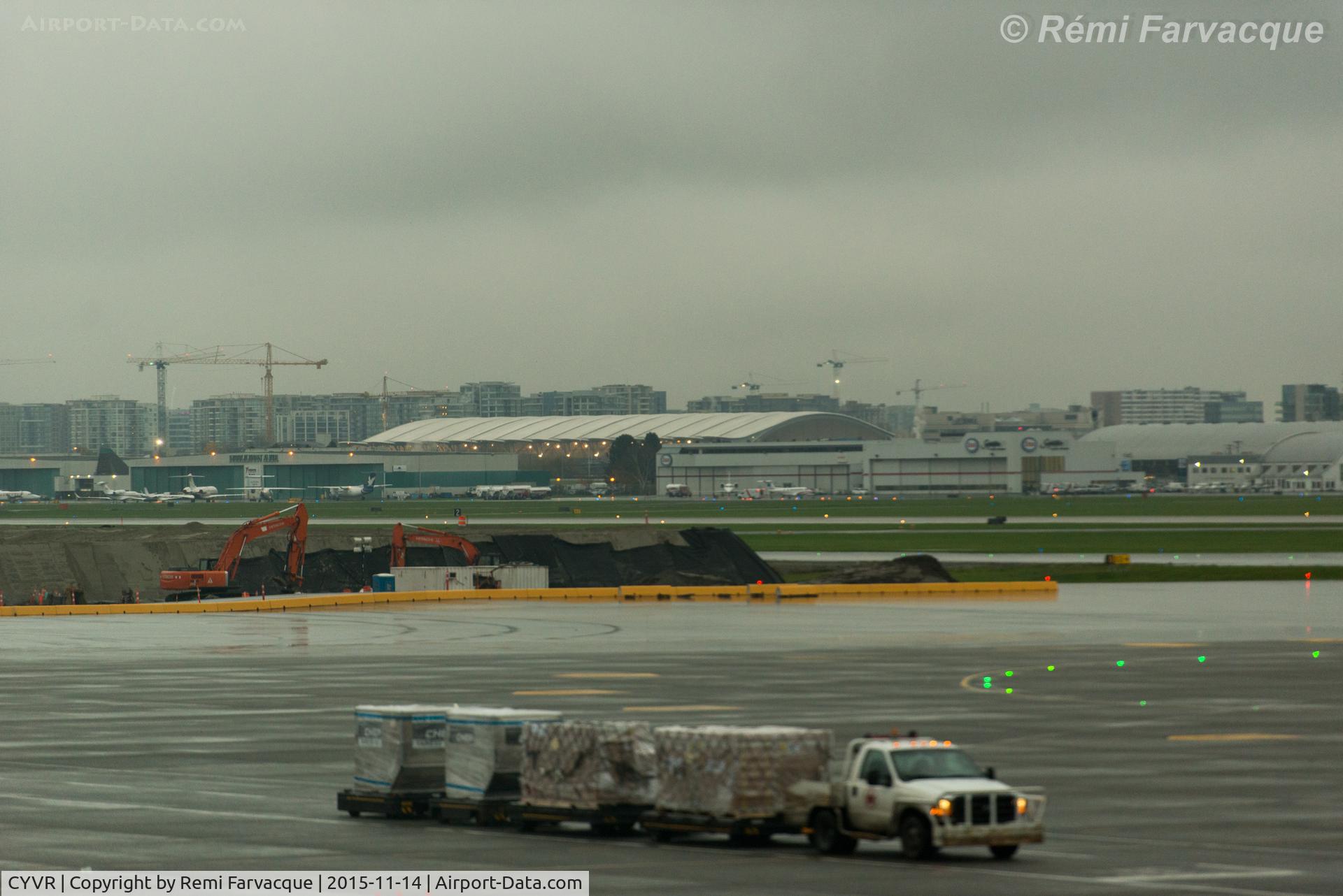 Vancouver International Airport, Vancouver, British Columbia Canada (CYVR) - View to southeast of south runway from domestic terminal. General activities.