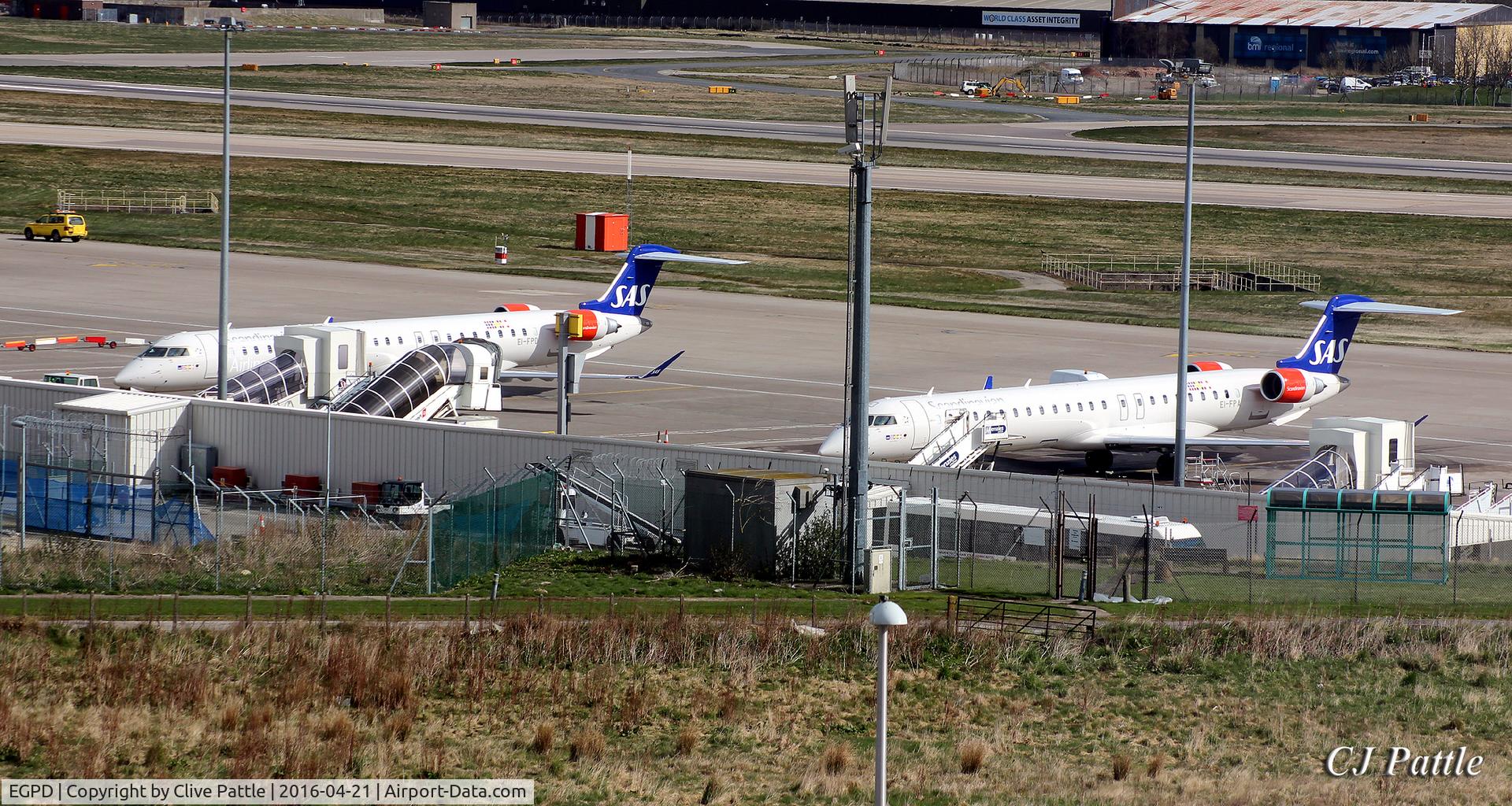 Aberdeen Airport, Aberdeen, Scotland United Kingdom (EGPD) - Two SAS CRJ-900LR's occupy the gates at Aberdeen EGPD - on flights from Stavanger and Copenhagen.