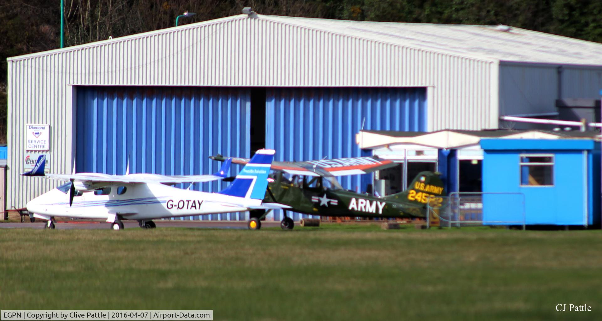 Dundee Airport, Dundee, Scotland United Kingdom (EGPN) - Tayside Aviation parking - Dundee Riverside EGPN/DND - note the privately owned based Cessna Birddog