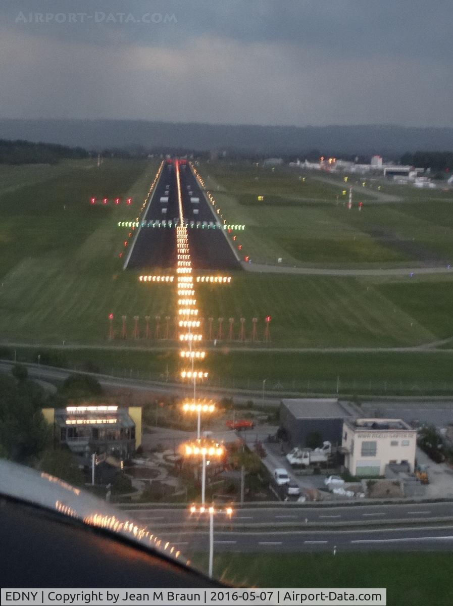 Bodensee Airport, Friedrichshafen Germany (EDNY) - Approach to land on runway 06 in the late evening