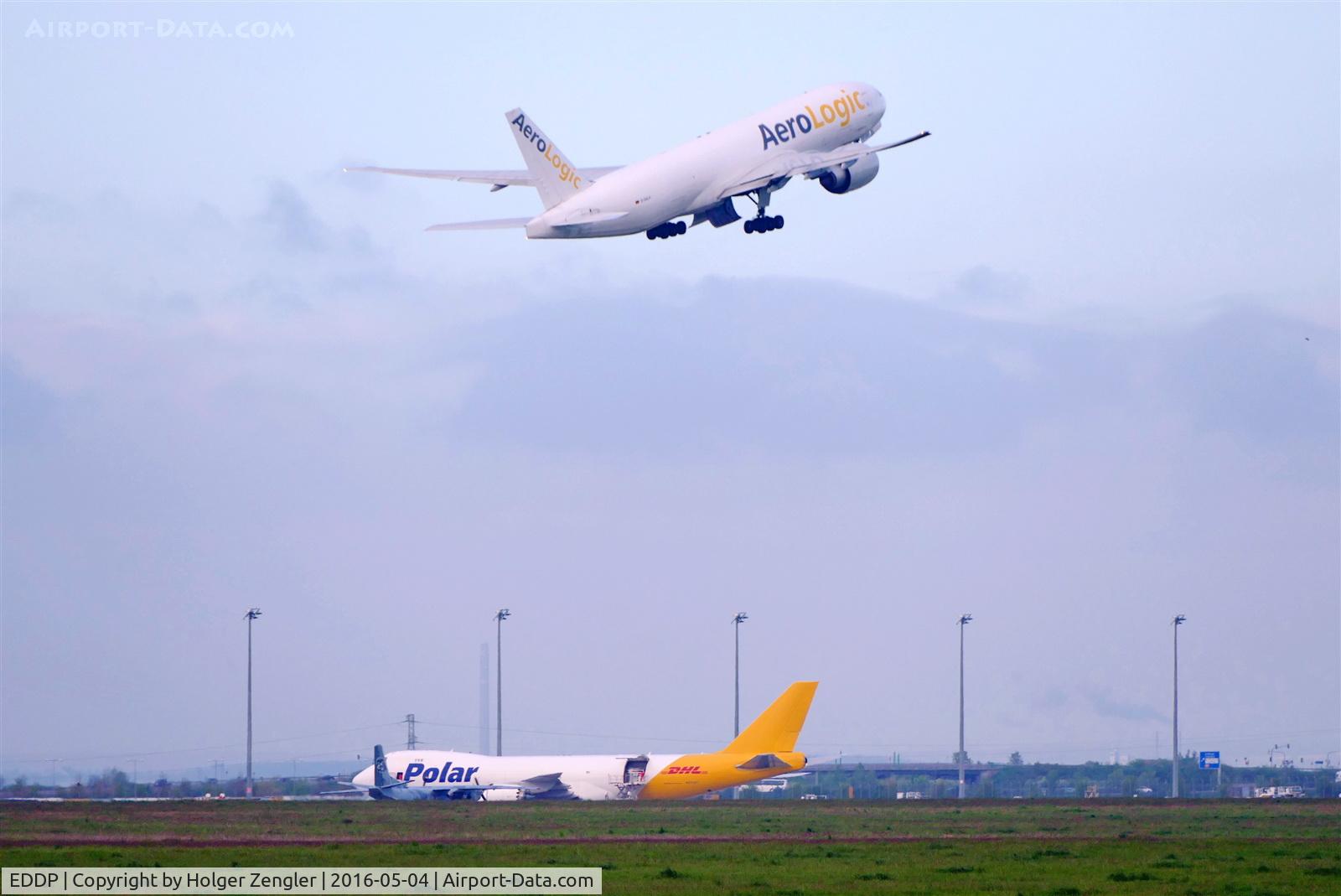 Leipzig/Halle Airport, Leipzig/Halle Germany (EDDP) - Outbound traffic on rwy 26L, giant and gnom on apron 2....
