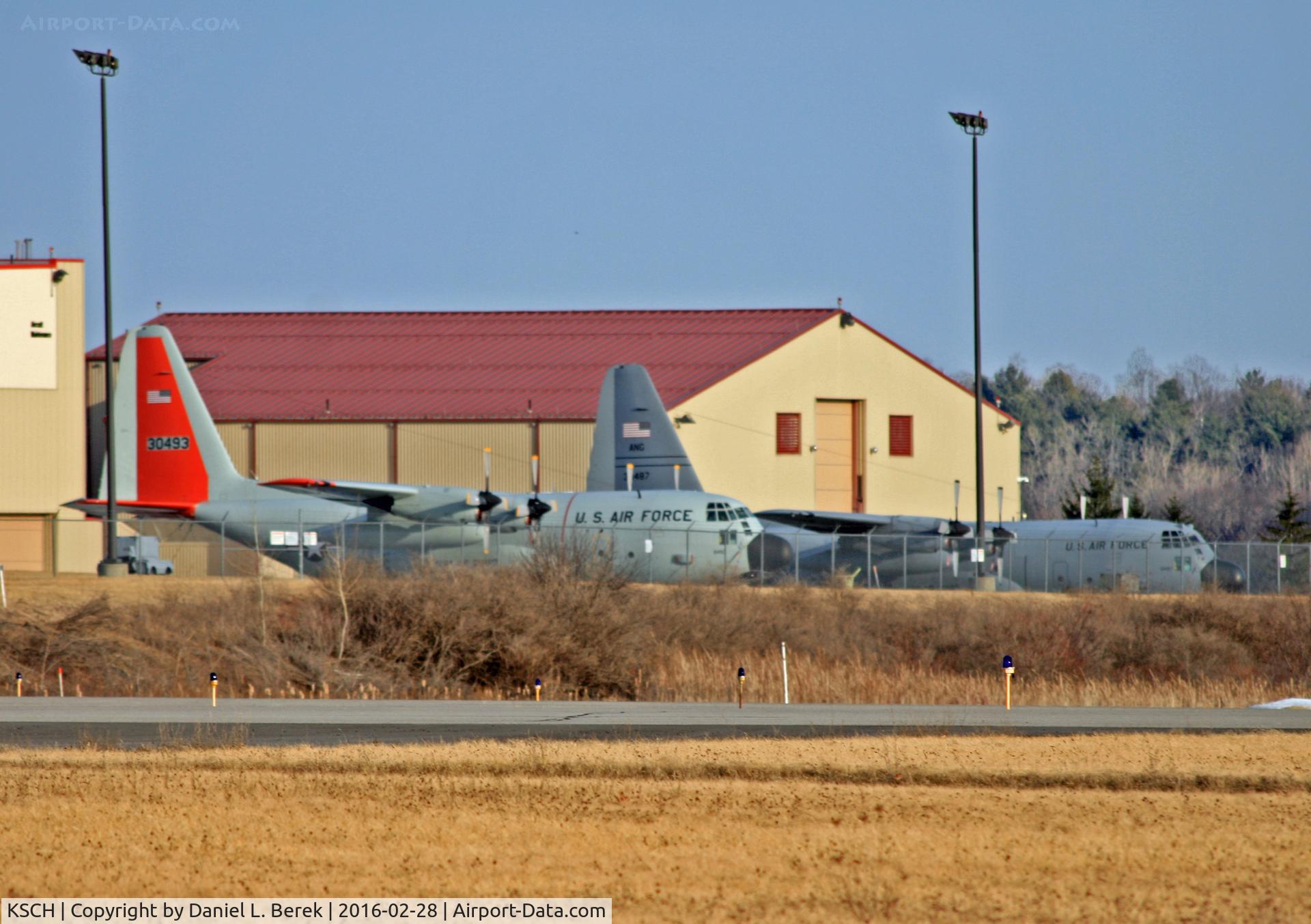 Schenectady County Airport (SCH) - Schenectady County Airport shares runways with the Stratton Air National Guard Base.  The Hercules in the foreground is part of the Antarctic Expedition.
