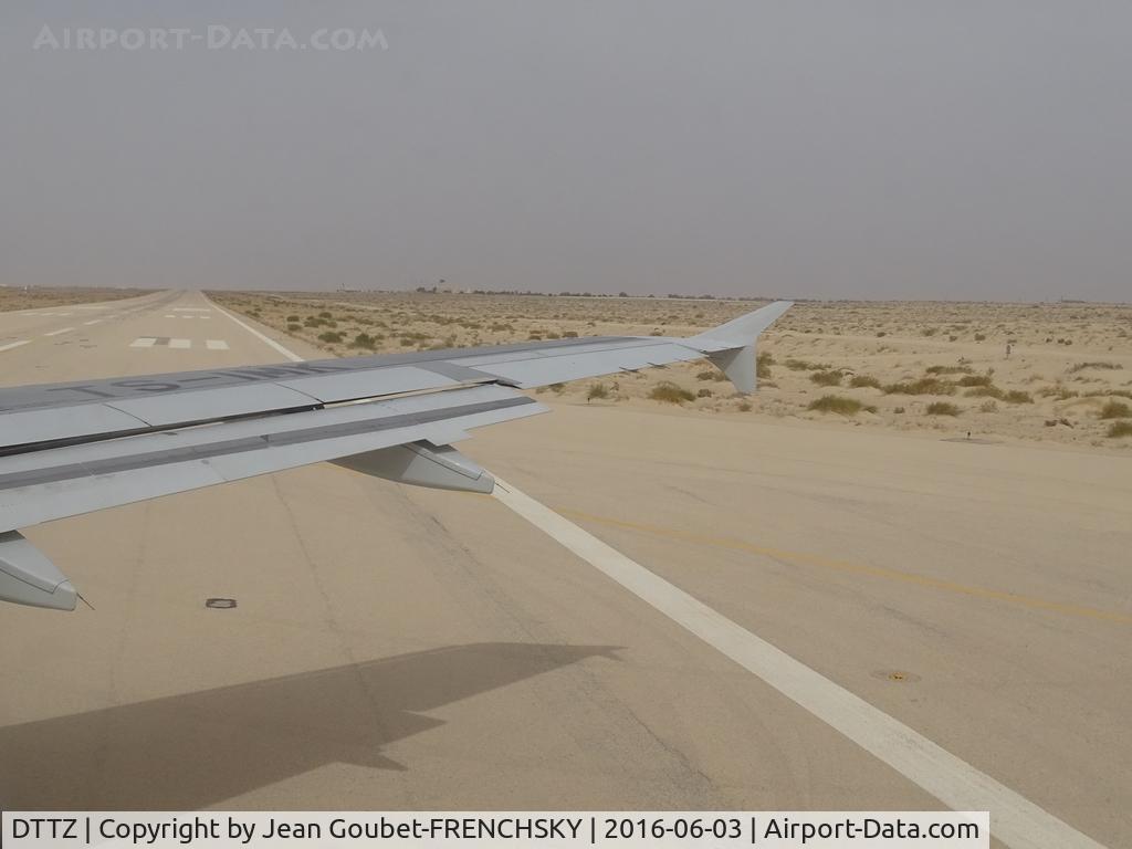 Nefta Airport, Tozeur Tunisia (DTTZ) - A319 TS-IMK from Paris Orly stop Tozeur to Djerba, take off runway 09