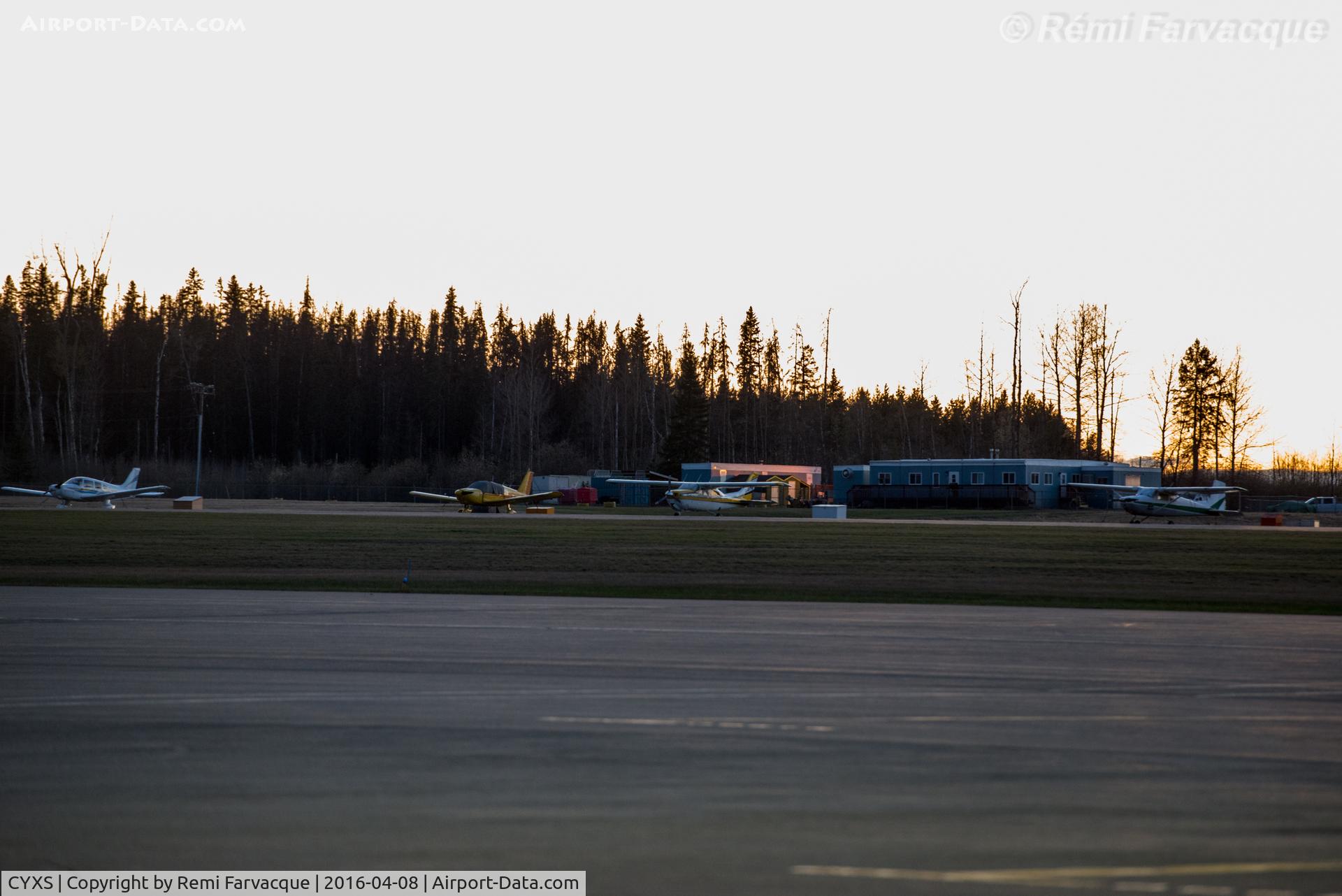 Prince George Airport, Prince George, British Columbia Canada (CYXS) - View of private aeroplanes parked in front of flying club offices.