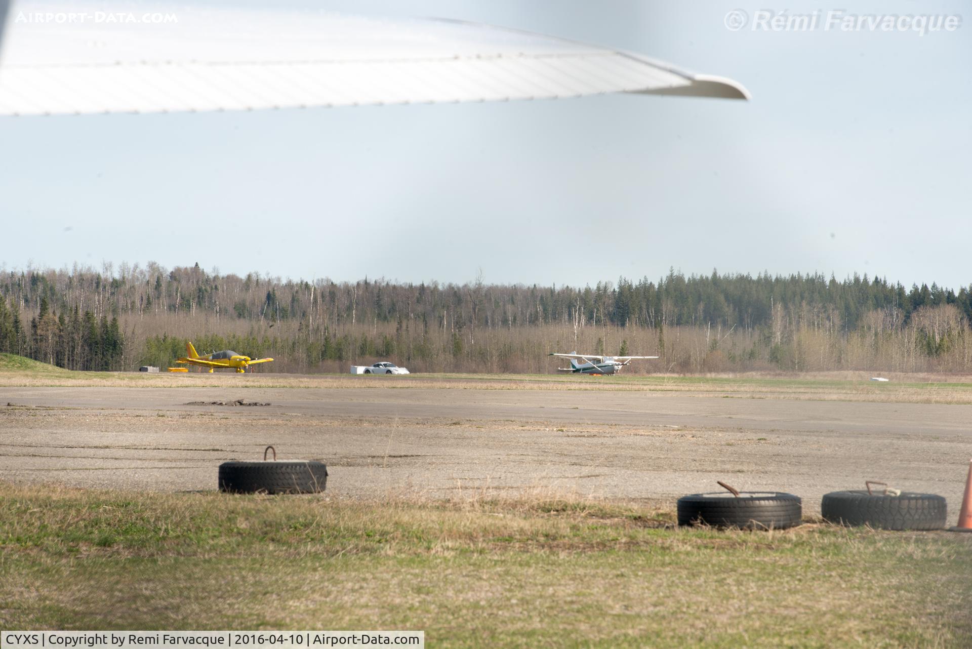 Prince George Airport, Prince George, British Columbia Canada (CYXS) - South end of airport - private craft and a porsche.