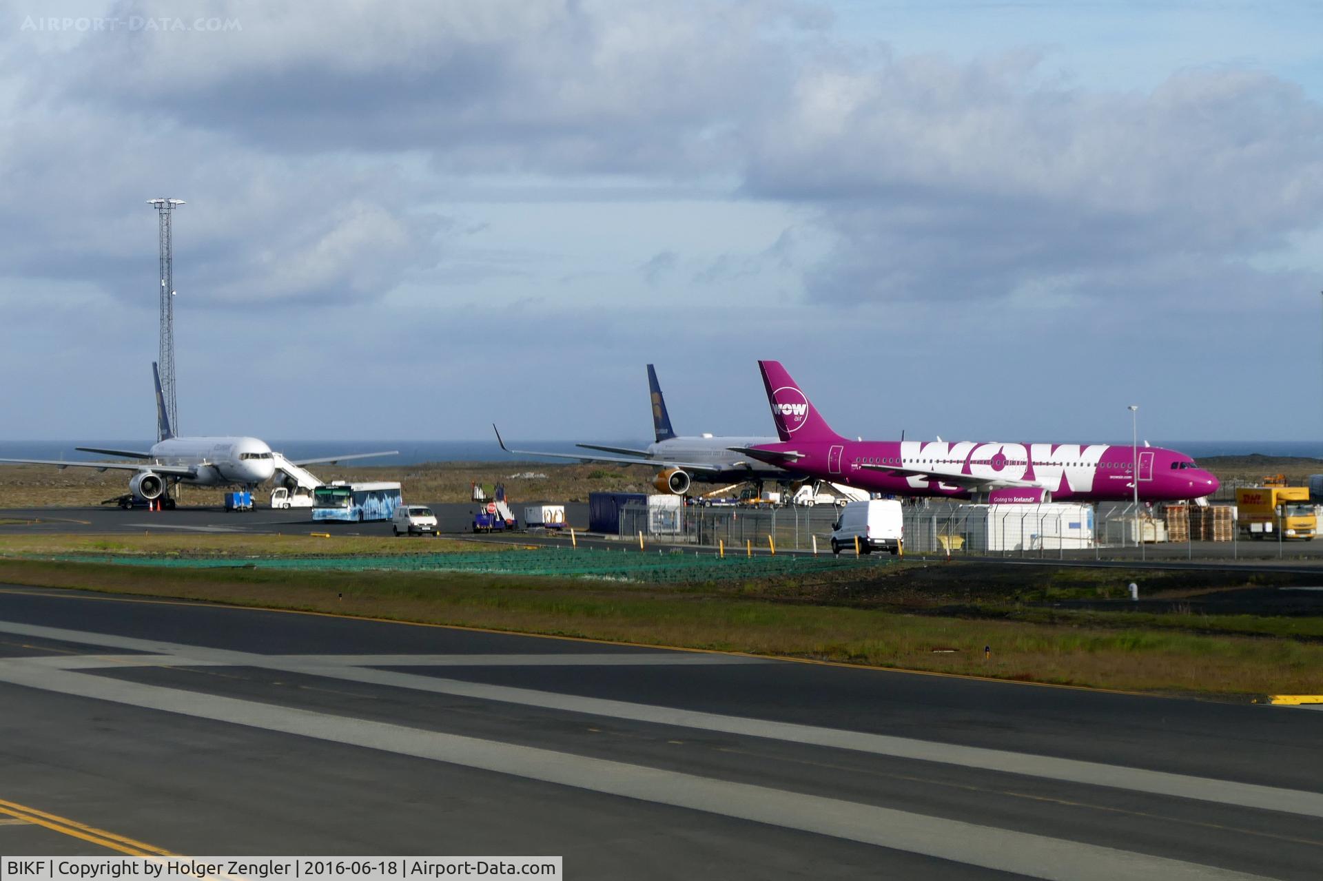Keflavík International Airport (Flugstöð Leifs Eiríkssonar), Keflavík Iceland (BIKF) - View to another apron on rather wide and open KEF....