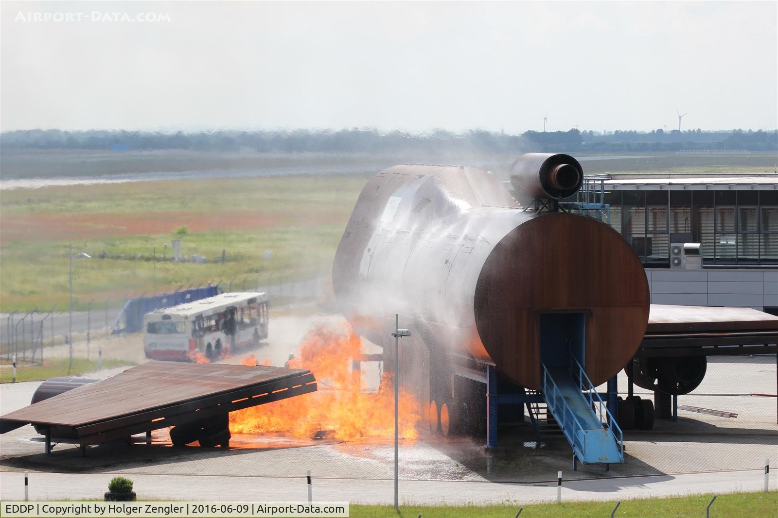 Leipzig/Halle Airport, Leipzig/Halle Germany (EDDP) - View from visitor´s hill to airports Fire Training Center .....