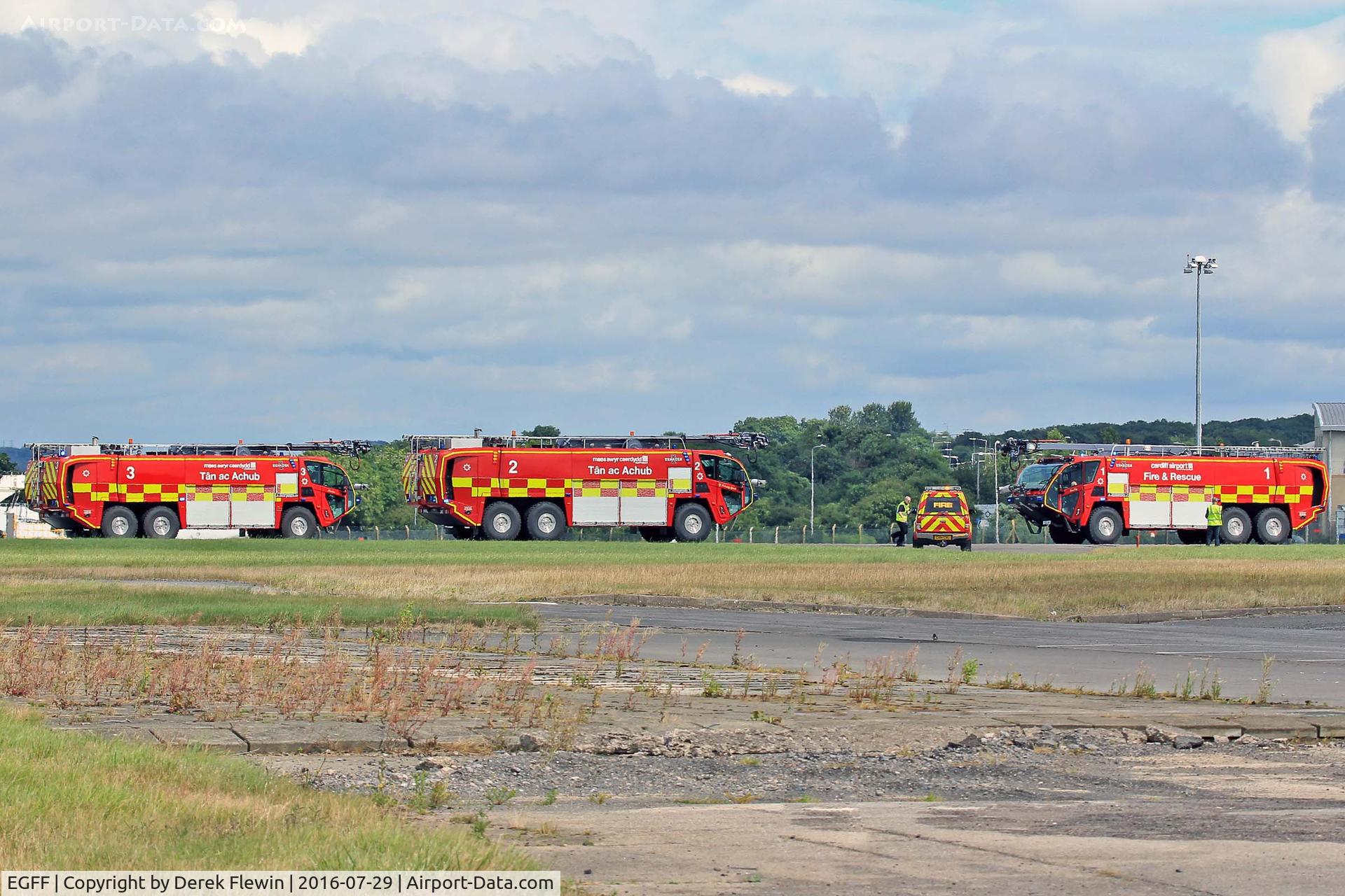 Cardiff International Airport, Cardiff, Wales United Kingdom (EGFF) - A trio of EGFF Fire Tenders having a photo shoot.