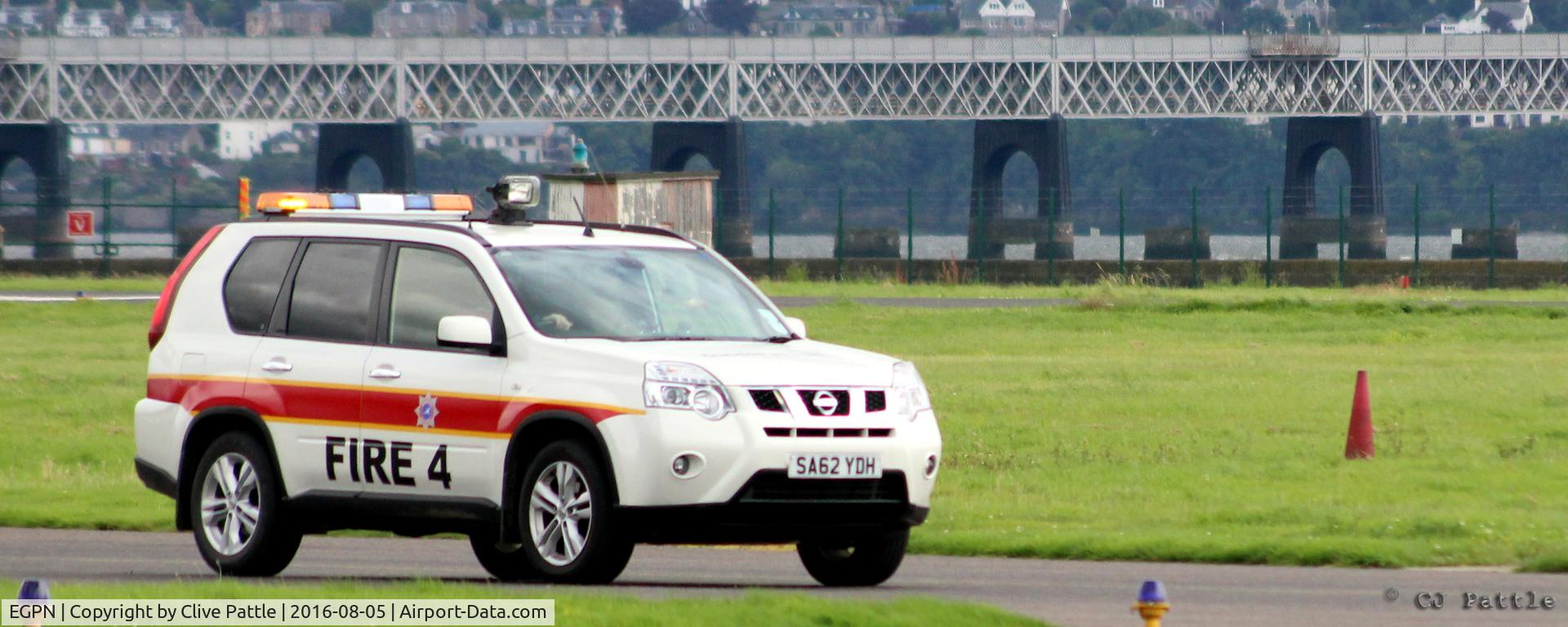 Dundee Airport, Dundee, Scotland United Kingdom (EGPN) - Fire 4 at Dundee Riverside airport EGPN with the River Tay Rail Bridge in the background
