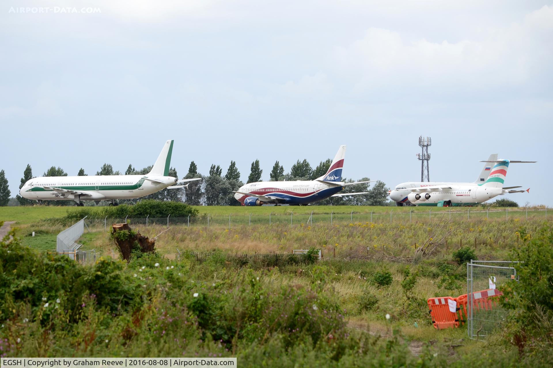 Norwich International Airport, Norwich, England United Kingdom (EGSH) - Storeage area at Norwich with I-BIXE, 5N-MJA and P4-GIU shown. 