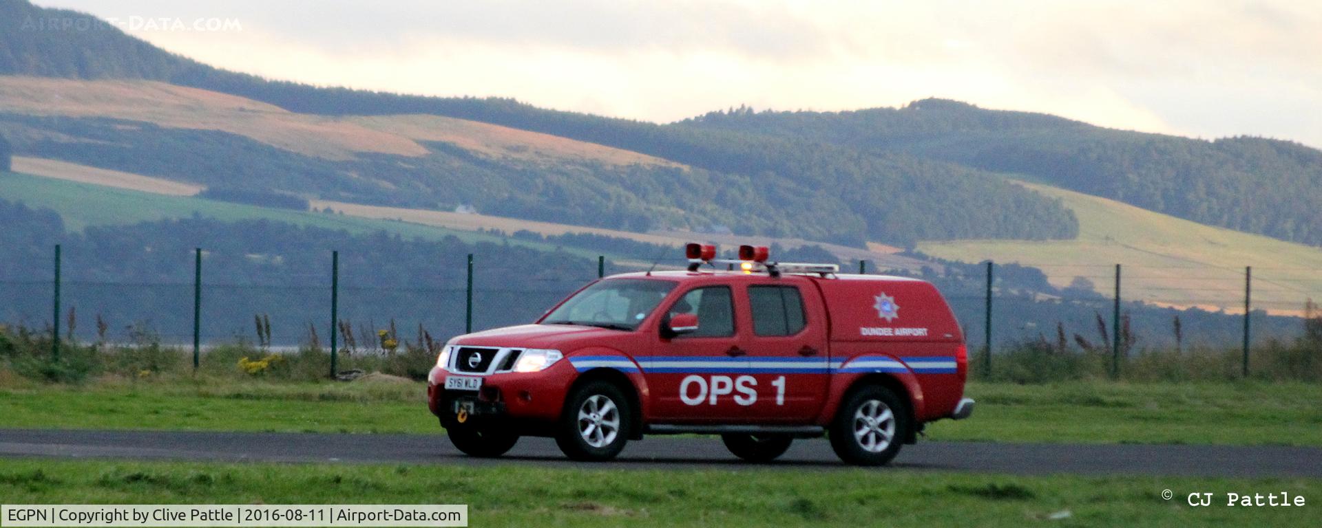 Dundee Airport, Dundee, Scotland United Kingdom (EGPN) - Ops 1 airport vehicle clears the birds and checks the runway at Dundee EGPN before the last flight of the day arrives.