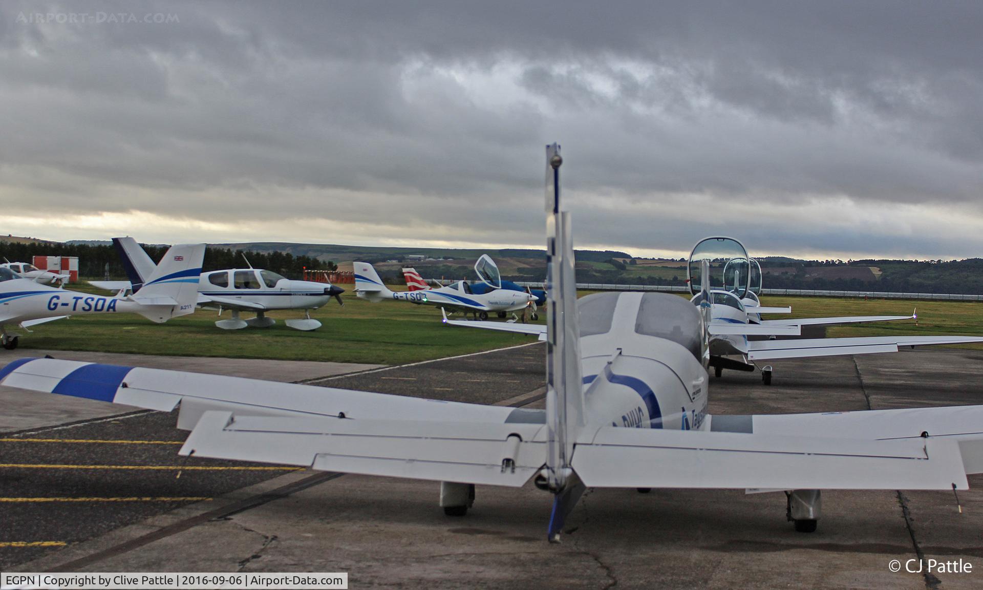 Dundee Airport, Dundee, Scotland United Kingdom (EGPN) - Tayside Aviation and other visiting aircraft parked up early morning at Dundee EGPN