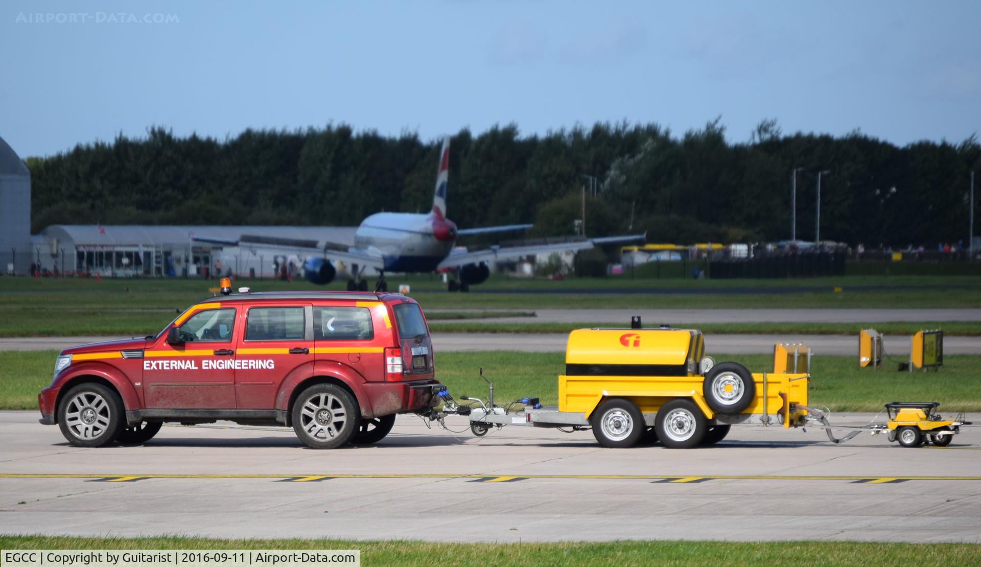Manchester Airport, Manchester, England United Kingdom (EGCC) - Runway calibration vehicle at Manchester