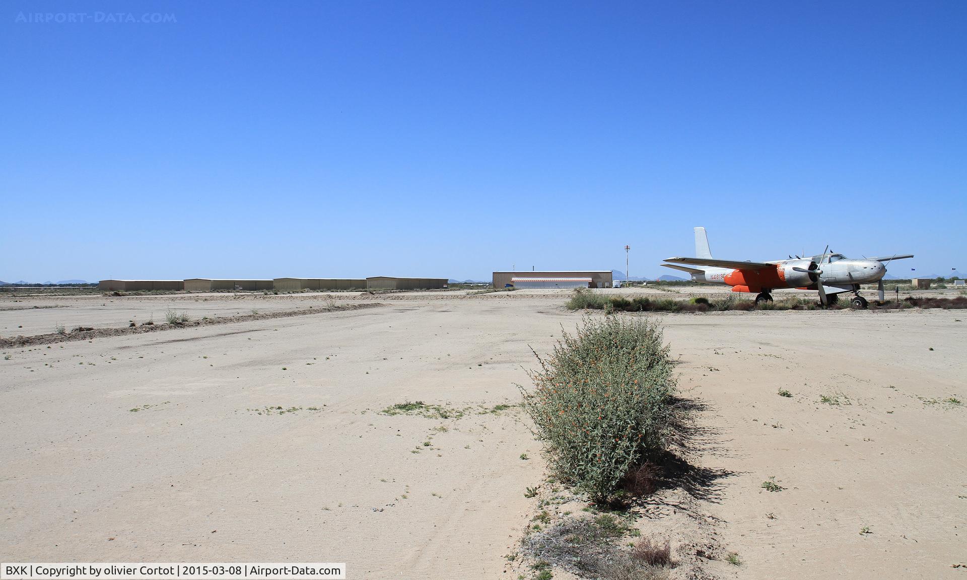 Buckeye Municipal Airport (BXK) - hangars and the gate guardian