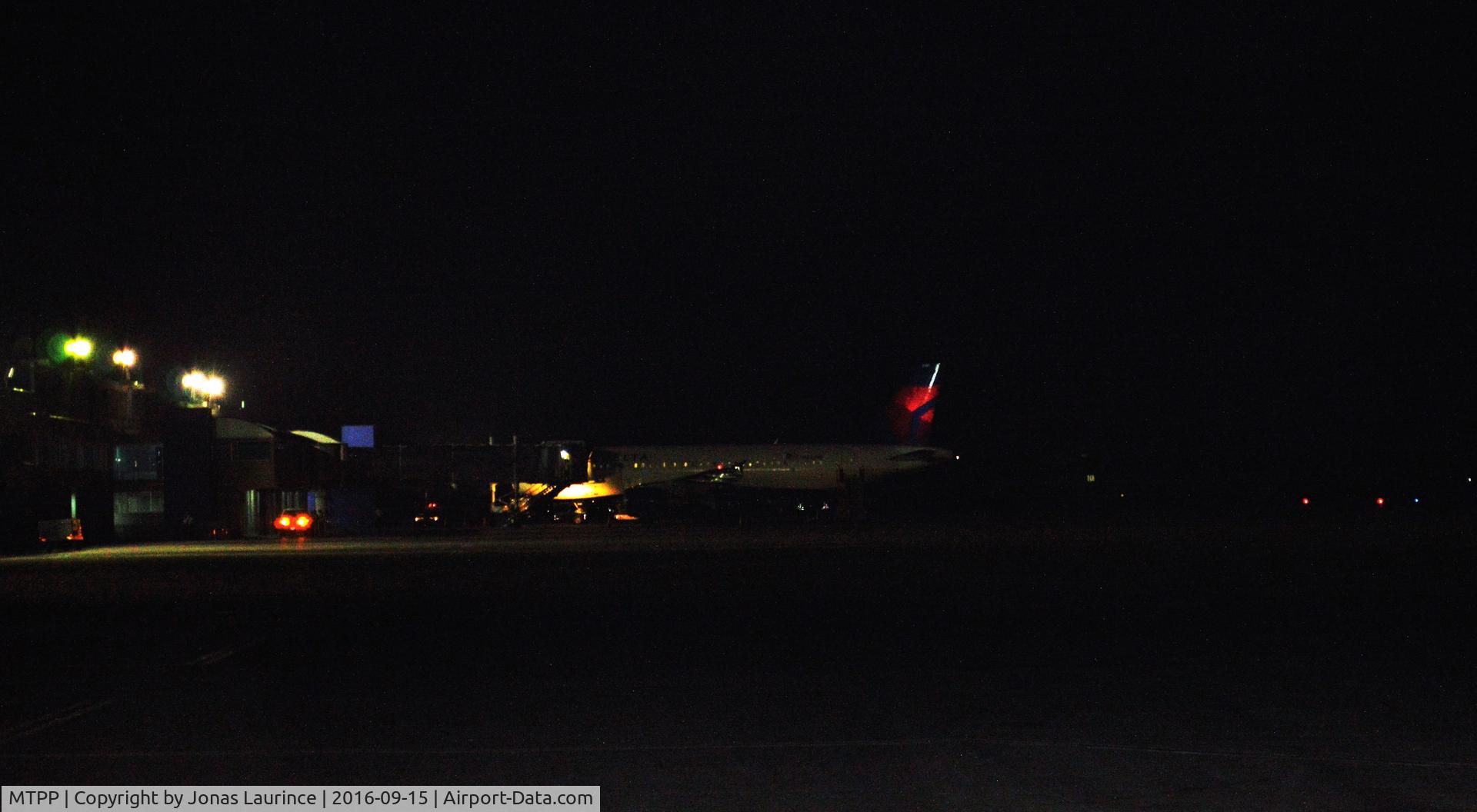 Port-au-Prince International Airport (Toussaint Louverture Int'l), Port-au-Prince Haiti (MTPP) - Delta Airlines Aircraft boarding at the Jetbridge of the Toussaint Louverture International Airport of Port-au-Prince 