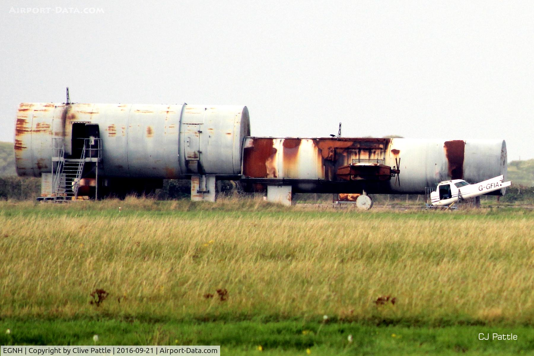Blackpool International Airport, Blackpool, England United Kingdom (EGNH) - Blackpool EGNH - Fire training area on southside. Remains of C152 G-GFIA are visible. Dumped Cougar G-OOGS is nearby (not in shot)