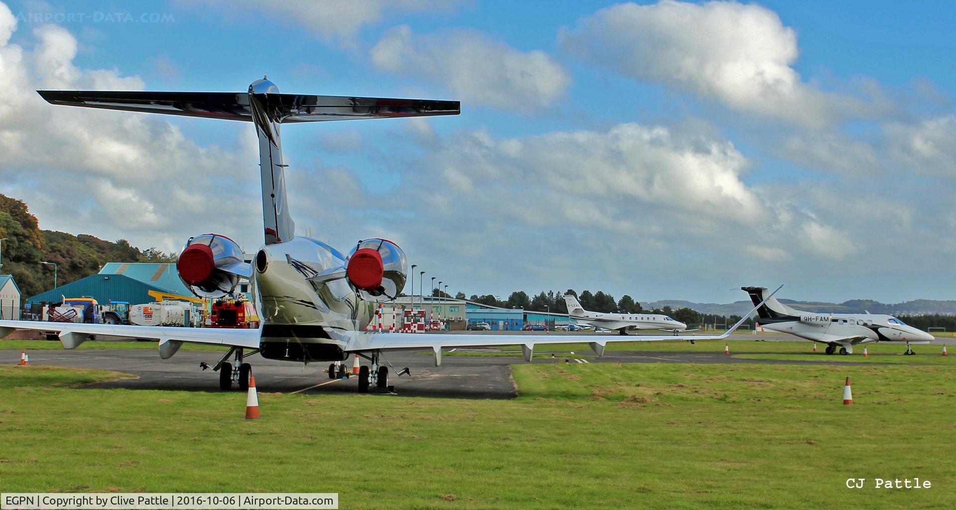 Dundee Airport, Dundee, Scotland United Kingdom (EGPN) - View of a busy apron at Dundee EGPN for the Annual Dunhill Golf Championships, held at nearby St Andrews.
