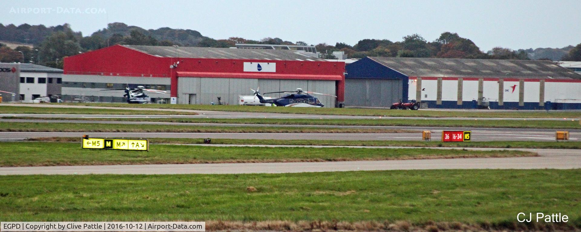 Aberdeen Airport, Aberdeen, Scotland United Kingdom (EGPD) - The Bond Helicopters hangar at ABZ has now lost its titles and now displays the 'Babcock MCS' signs
