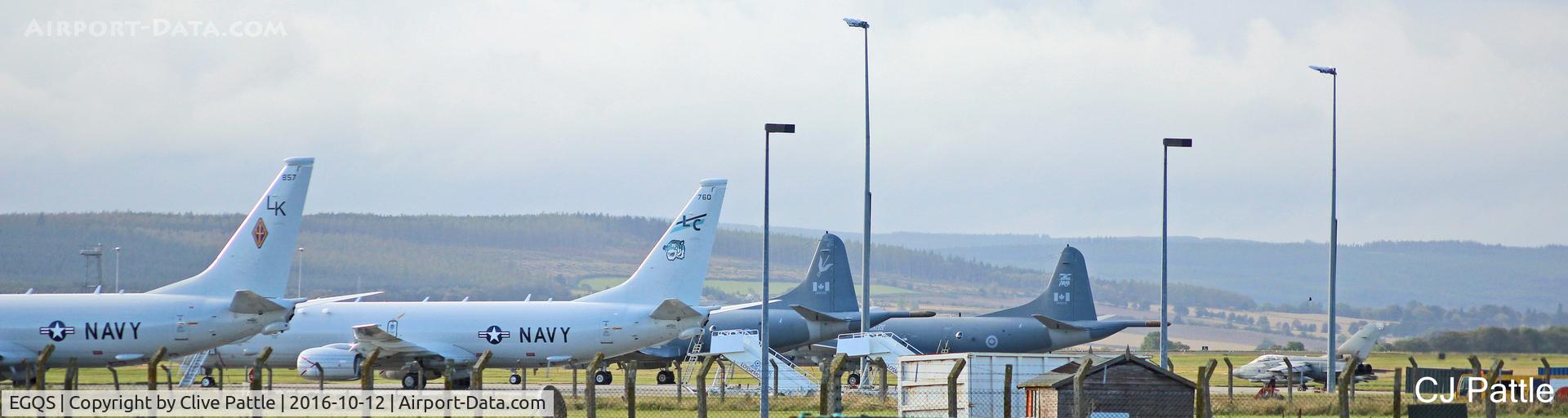 RAF Lossiemouth Airport, Lossiemouth, Scotland United Kingdom (EGQS) - Over the fence at RAF Lossiemouth EGQS during Exercise Joint Warrior 16-2. Maritime Patrol Aircraft parked on the northern apron - 2 x P-8's and 2 x CP-140 Auroras await their next nightime missions.