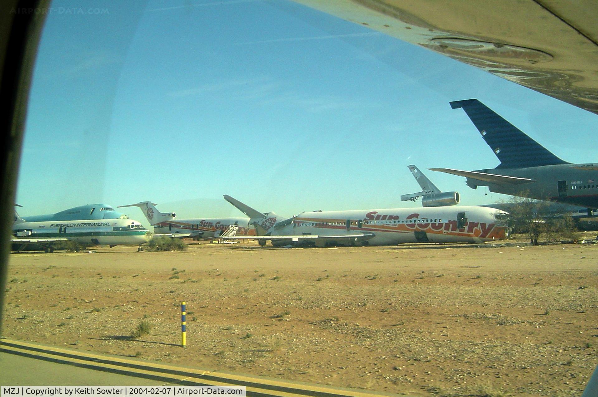 Pinal Airpark Airport (MZJ) - Taken through aircraft window whilst taxying past