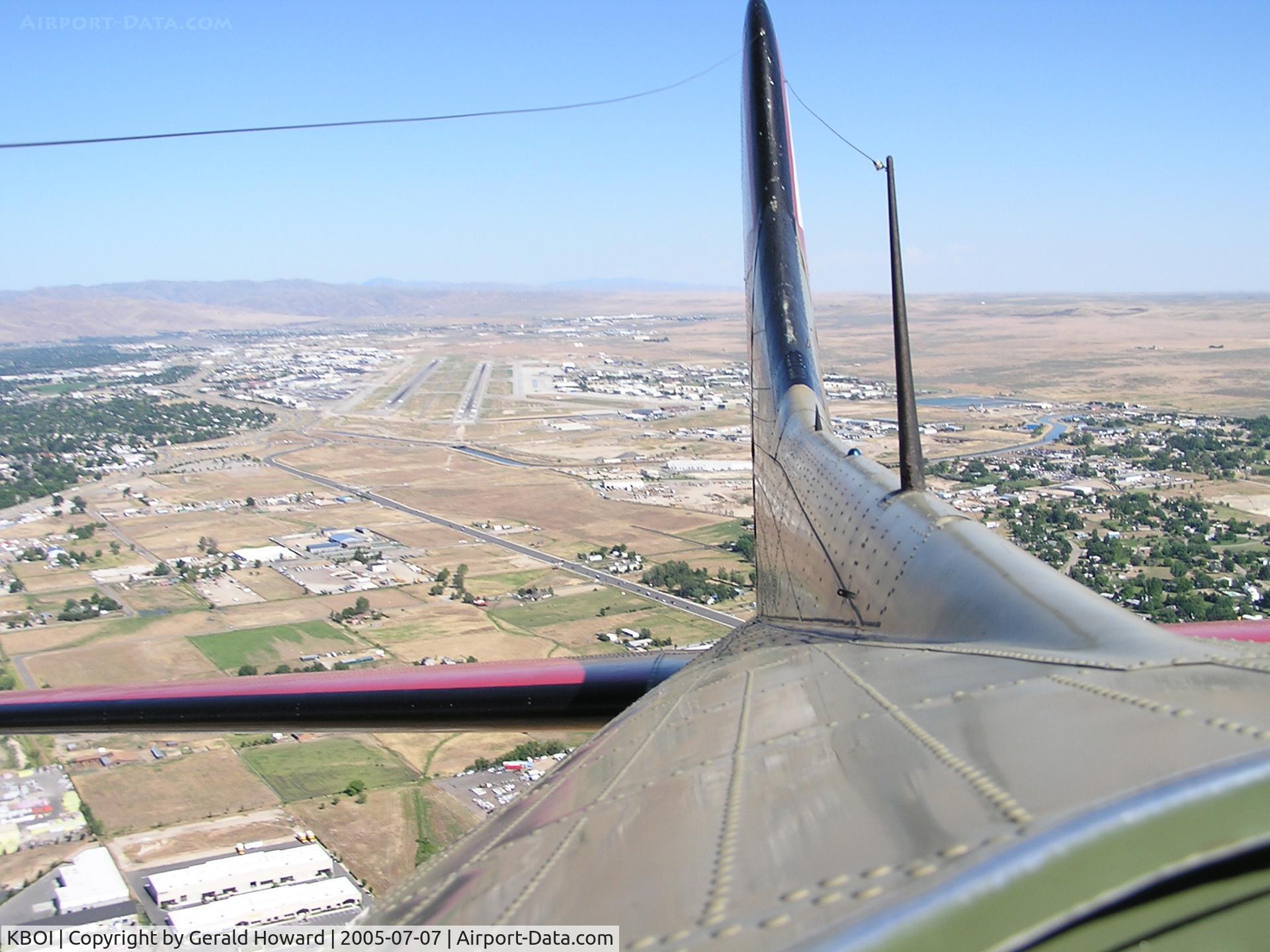 Boise Air Terminal/gowen Fld Airport (BOI) - Looking back at runways 10R & 10L from the radio compartment of a B-17. We have just taken off from RWY 28R.