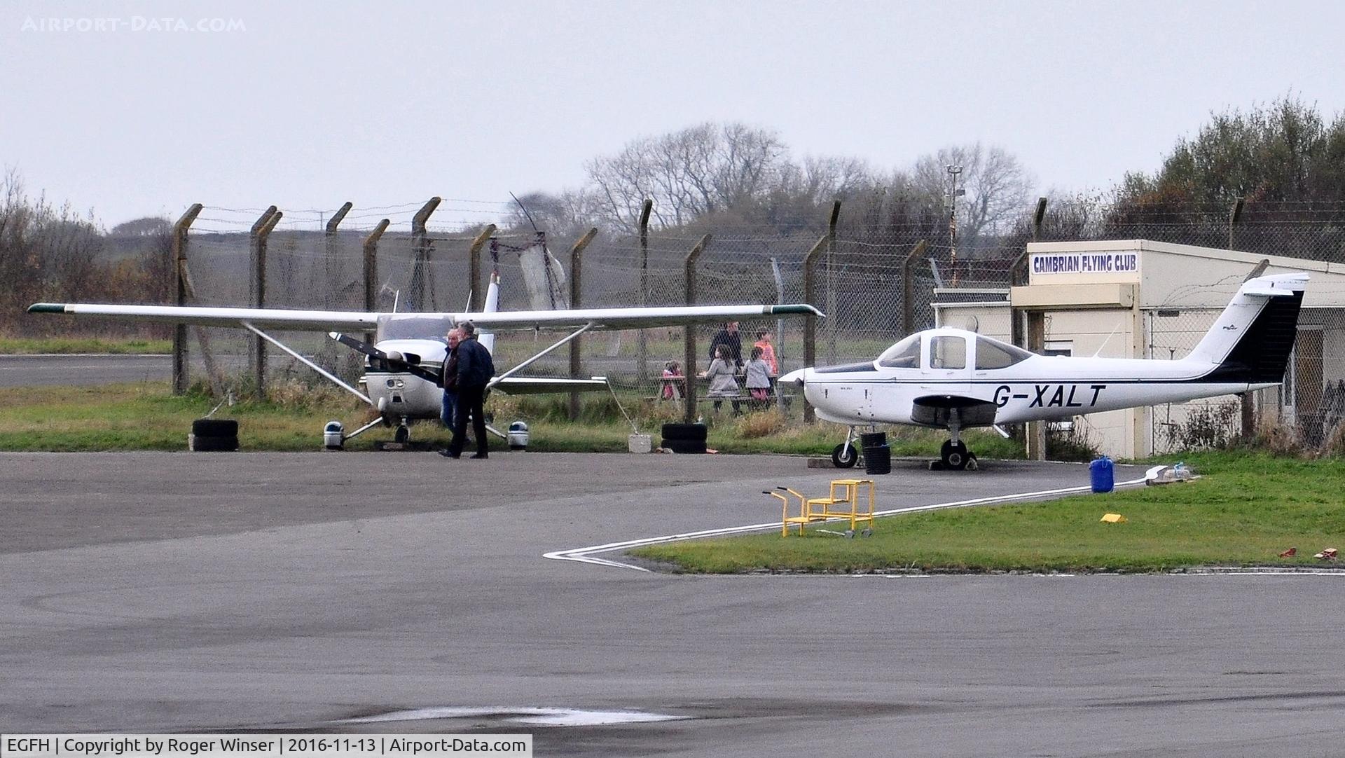 Swansea Airport, Swansea, Wales United Kingdom (EGFH) - Two of Cambrian Flying Club's six aircraft.
