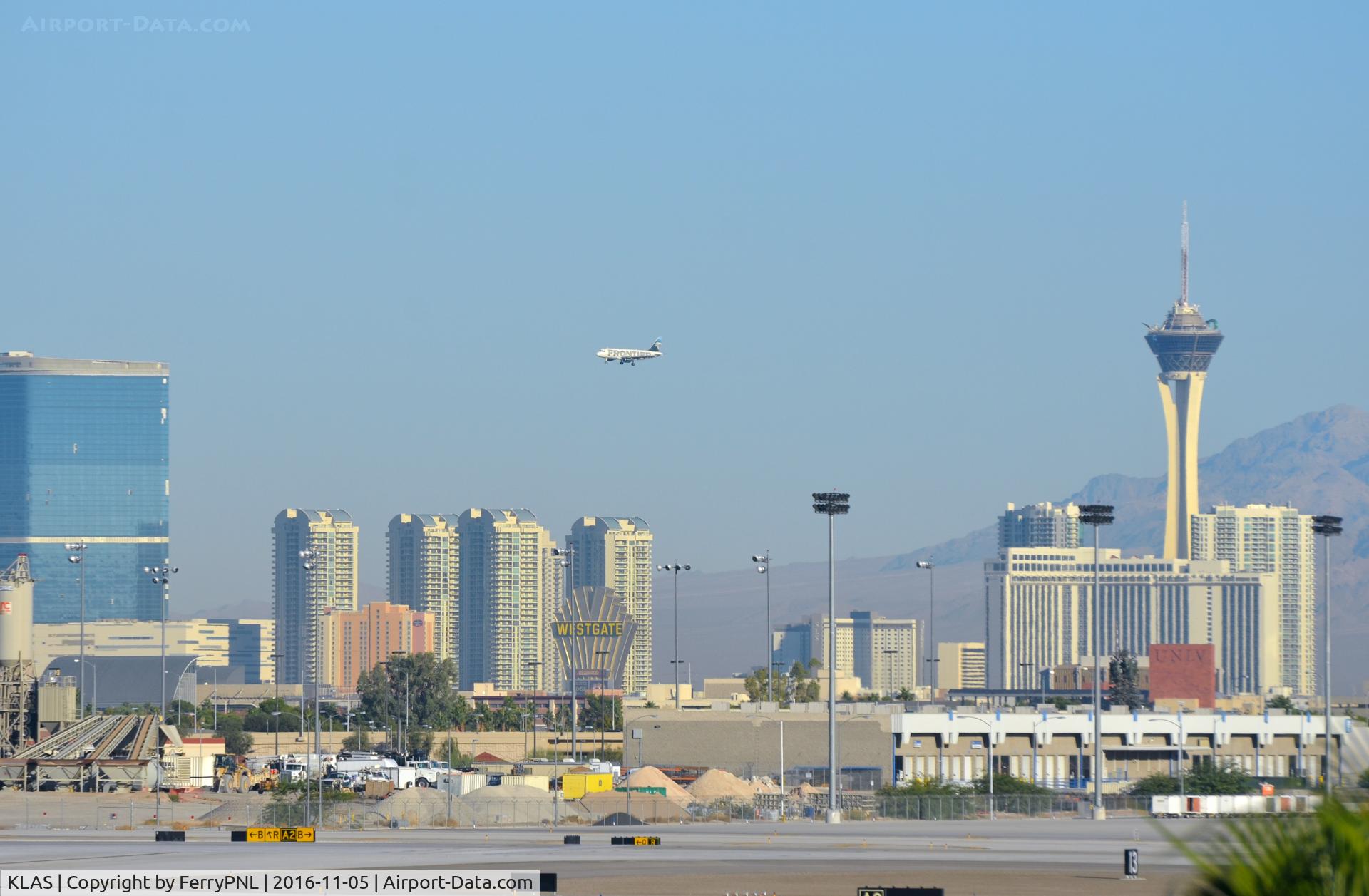 Harry Reid International Airport (LAS) - Frontier Airbus arriving over the city 