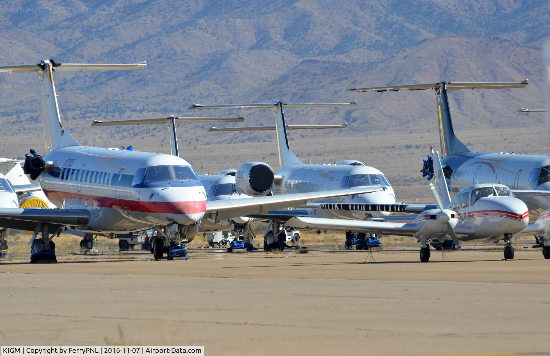 Kingman Airport (IGM) - Ramp with a few of the Embraers stored in IGM.