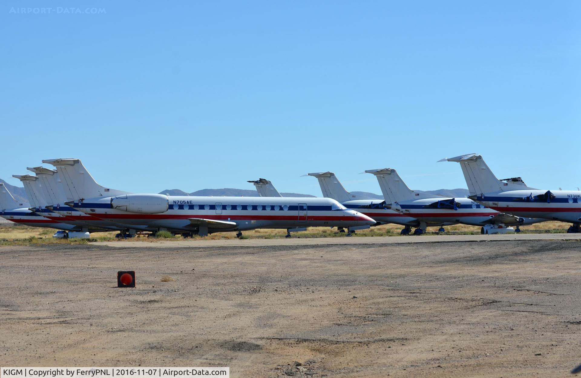 Kingman Airport (IGM) - Some of the many American Eagle Embraers stored in Kingman, AZ.