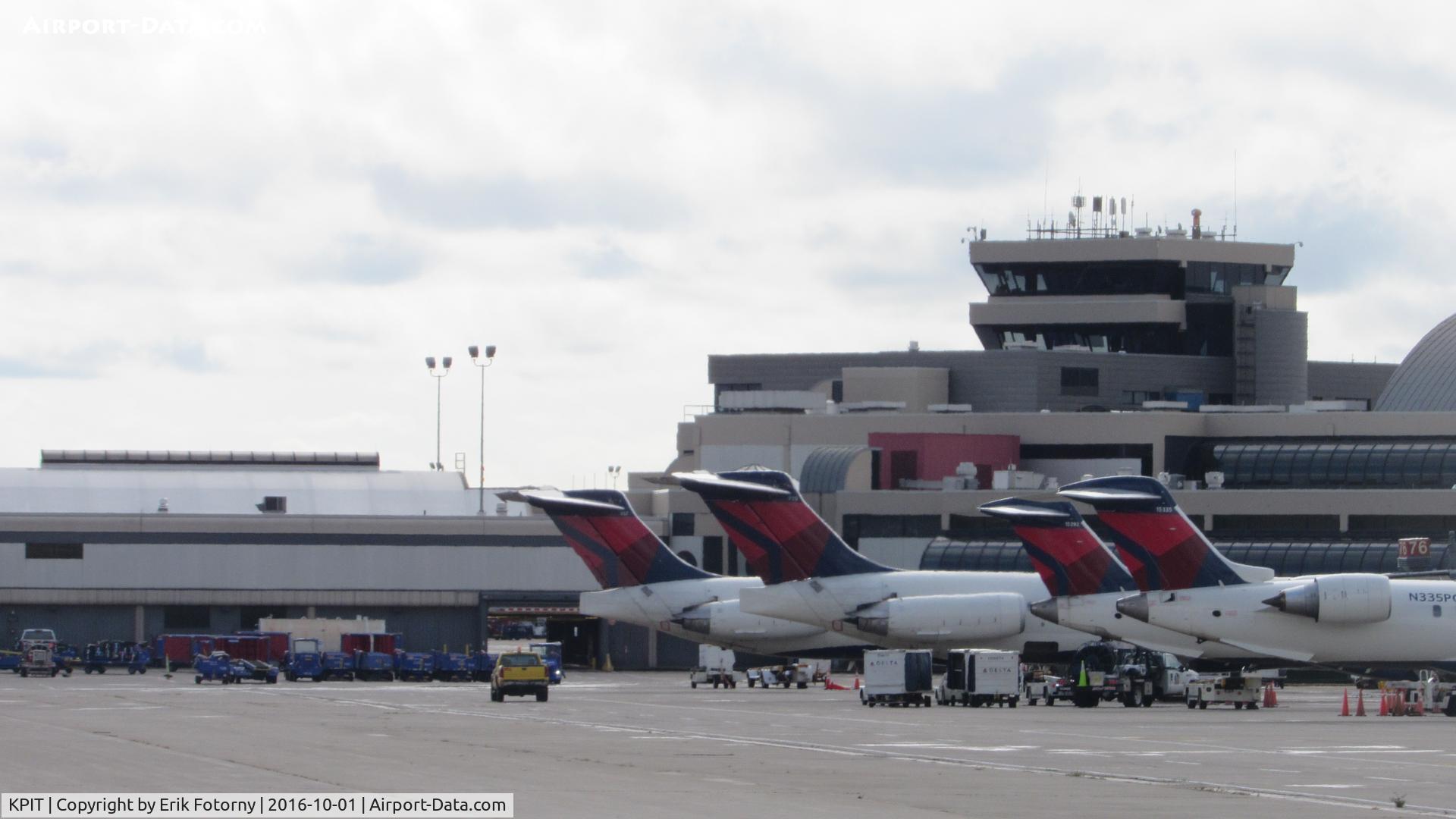 Pittsburgh International Airport (PIT) - Two Delta CRJ-700's and two Delta MD-88's.