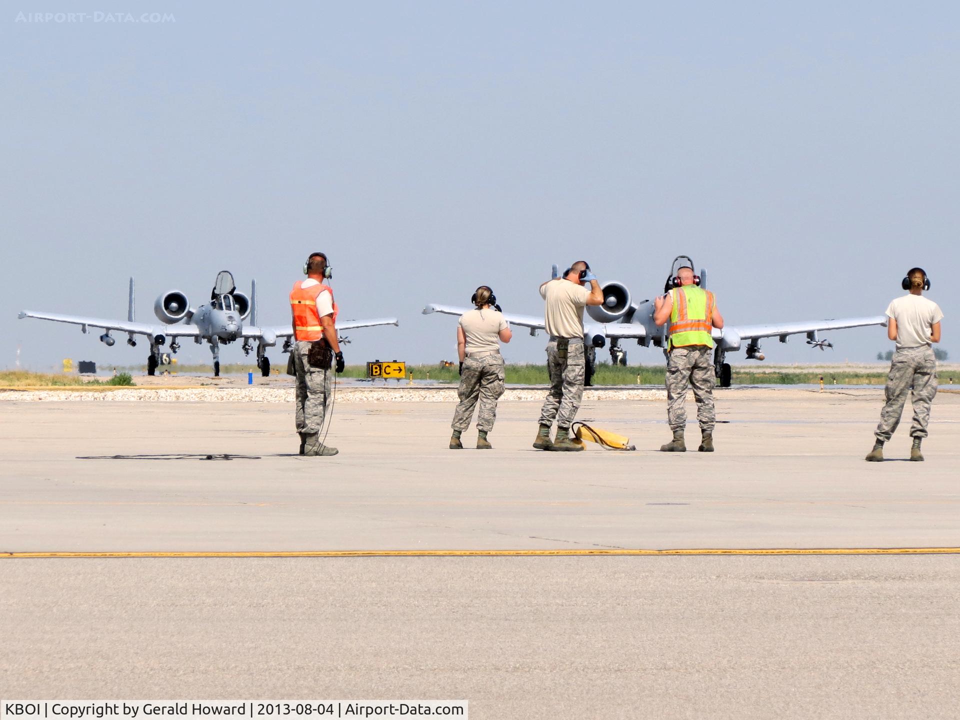 Boise Air Terminal/gowen Fld Airport (BOI) - Idaho ANG members awaiting A-10Cs on the east arm/de arm pad for pre flight checks. 190th Fighter Sq., 124th Fighter Wing.