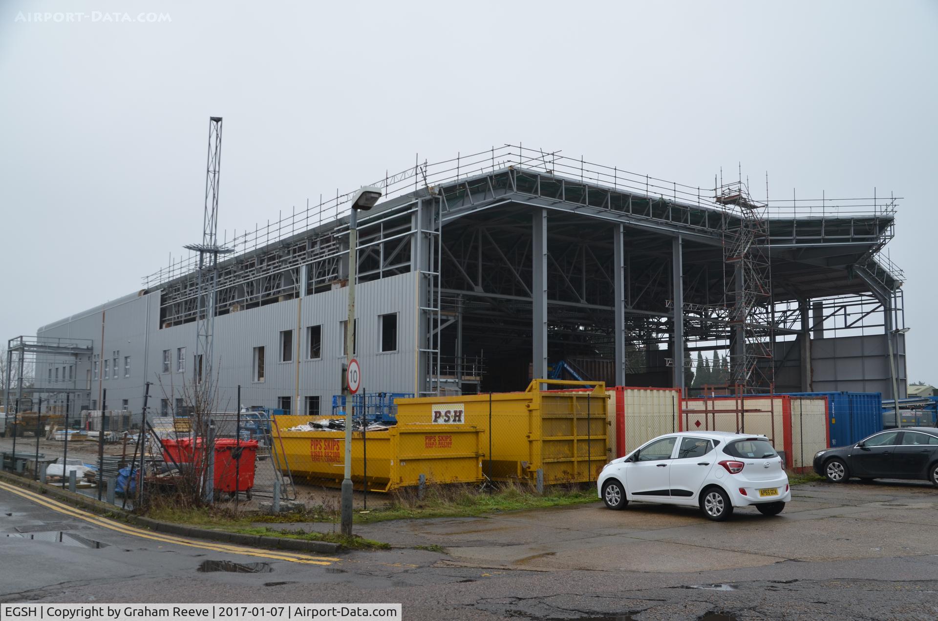 Norwich International Airport, Norwich, England United Kingdom (EGSH) - Hangar 5 under development at Norwich. 