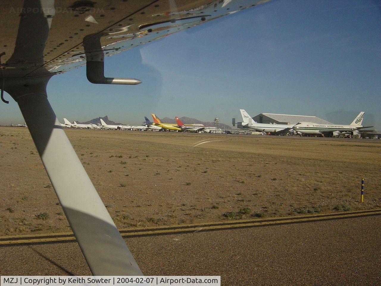 Pinal Airpark Airport (MZJ) - Image taken through perspex window of aircraft whilst overflying / taxying around 