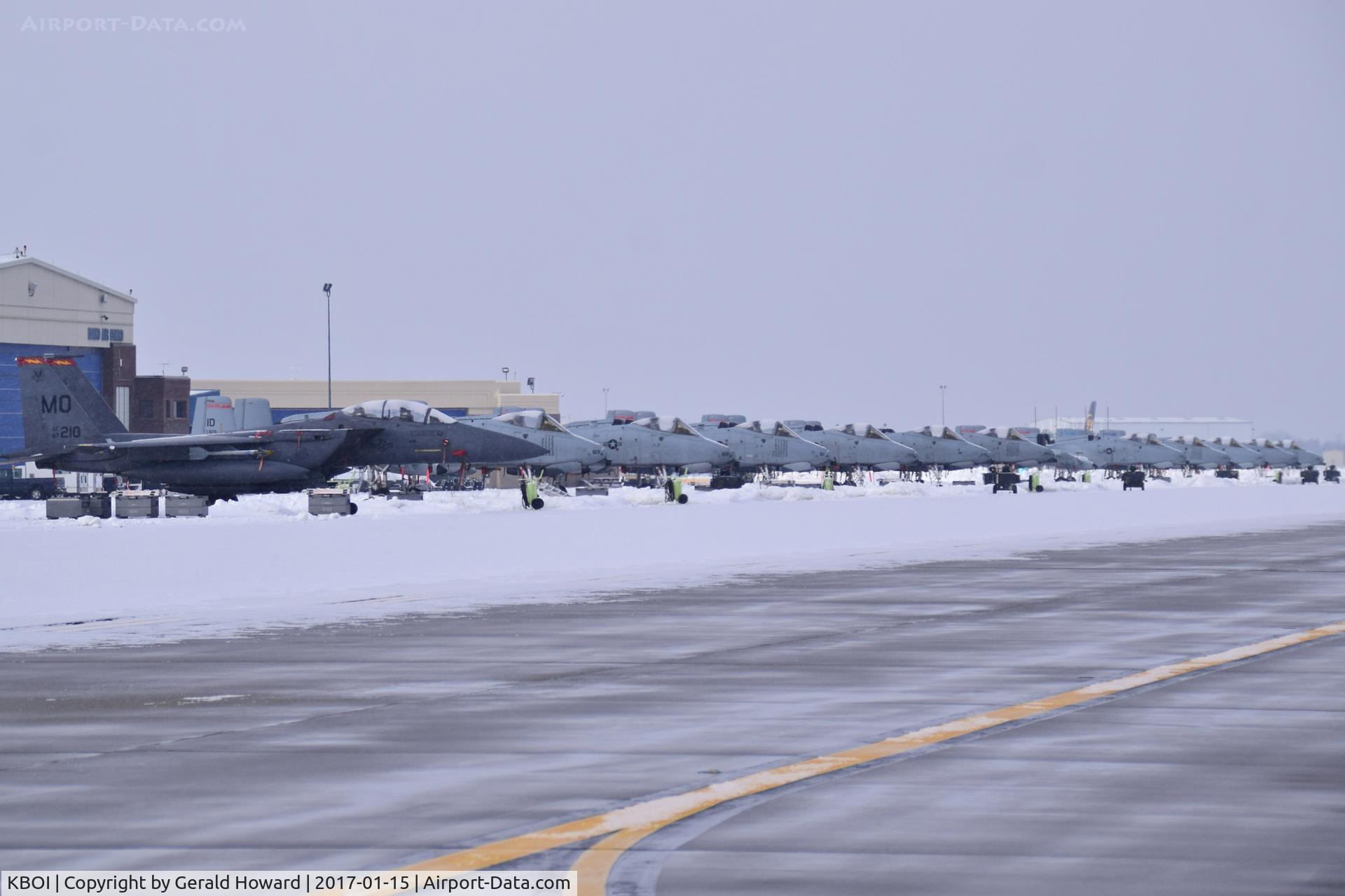 Boise Air Terminal/gowen Fld Airport (BOI) - A-10Cs of the 190th Fighter Sq., Idaho ANG parked after the latest snow storm  with a visiting F-15E from Mountain Home AFB, Idaho.