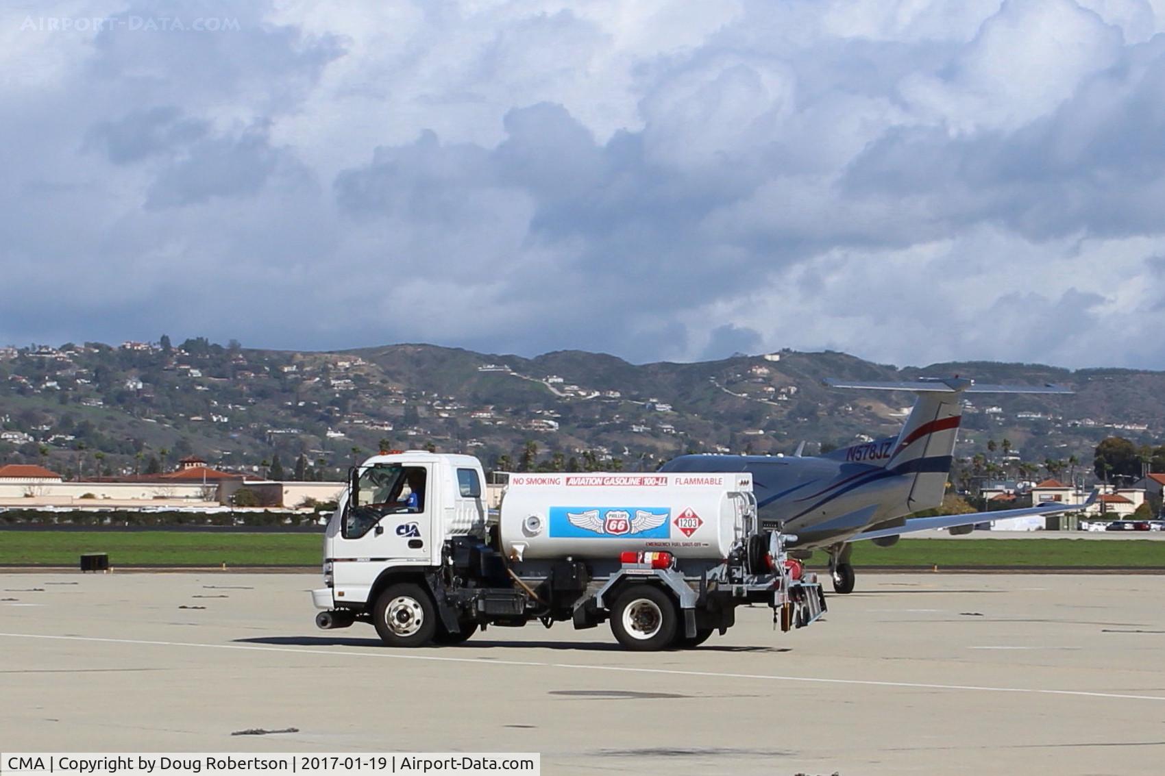 Camarillo Airport (CMA) - Channel Islands Aviation Phillips 66 100LL Fuel Truck, Cessna dealer and FBO since 1976, crossing their ramp.