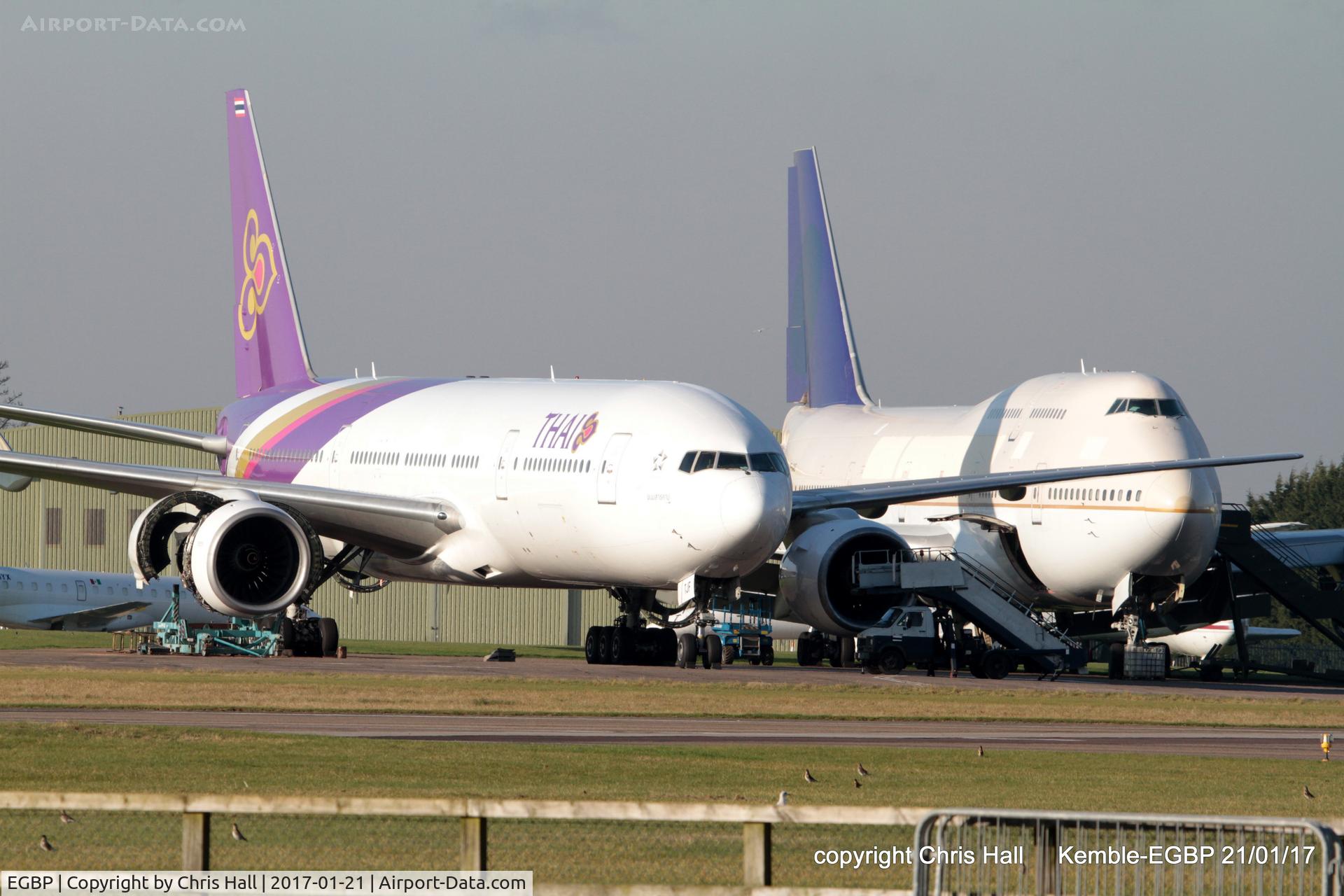Kemble Airport, Kemble, England United Kingdom (EGBP) - Thai B777 and Saudi B747 in storage at Kemble