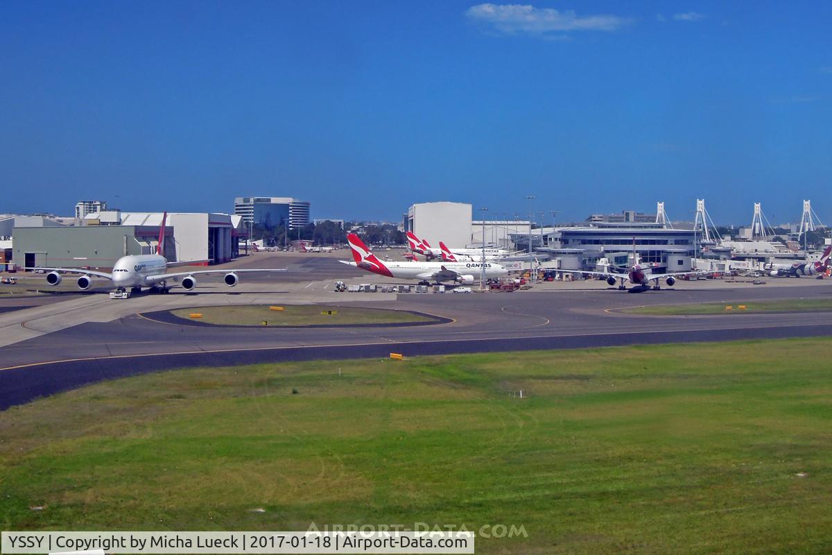Sydney Airport, Mascot, New South Wales Australia (YSSY) - QF maintenance base on the left, and QF domestic terminal on the right