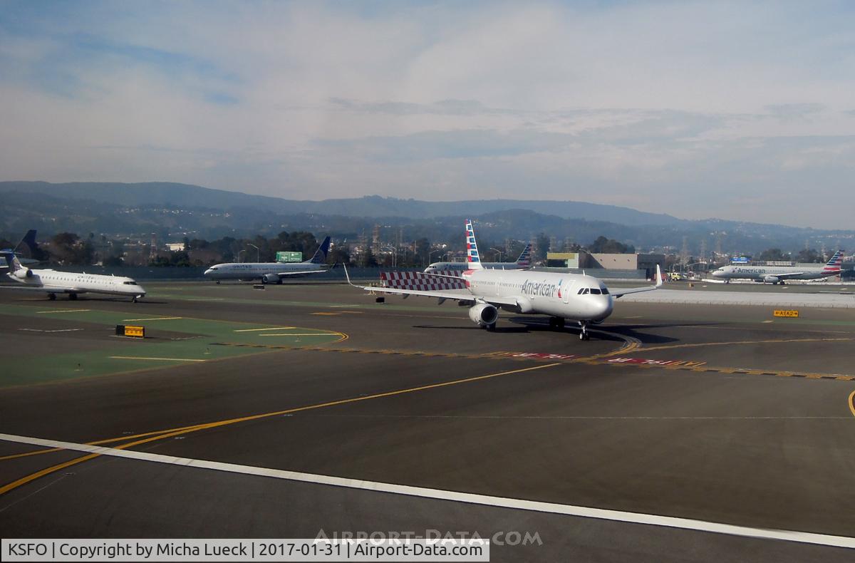 San Francisco International Airport (SFO) - Aircraft in the queue, while we are lining up on the runway for take-off (N211UA, SFO-ORD)